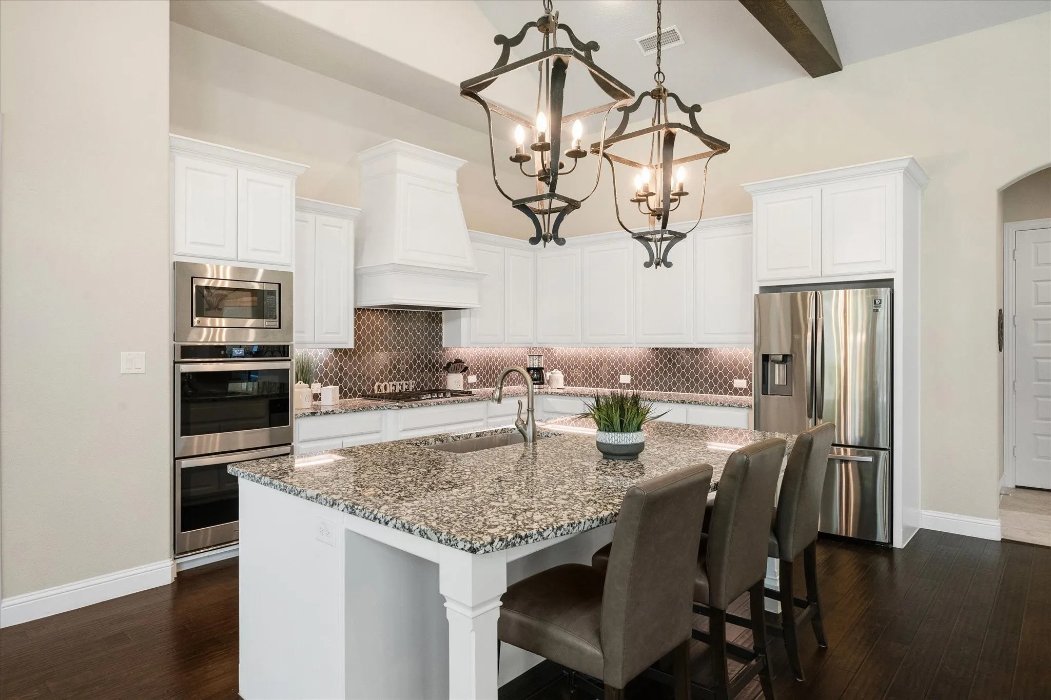 Center island is the heart of the kitchen and is perfect for family meals or entertaining.