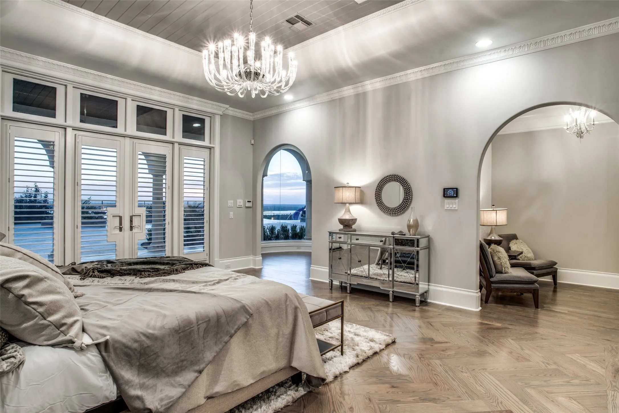 The luxurious master retreat features an anteroom, a large primary bedroom with private den.  A wall of windows provides breathtaking views of the resort style pool and views from Fort Worth to AT&T Stadium!