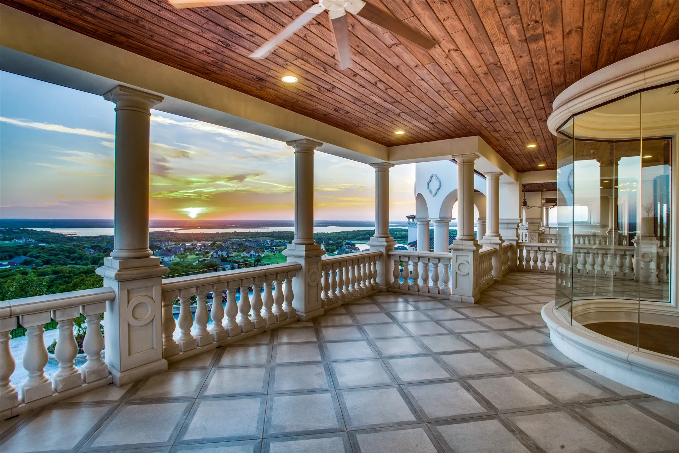 The second floor covered patio provides a comfortable respite from entertaining areas below, yet provides a higher perspective of the awe-inspiring views!