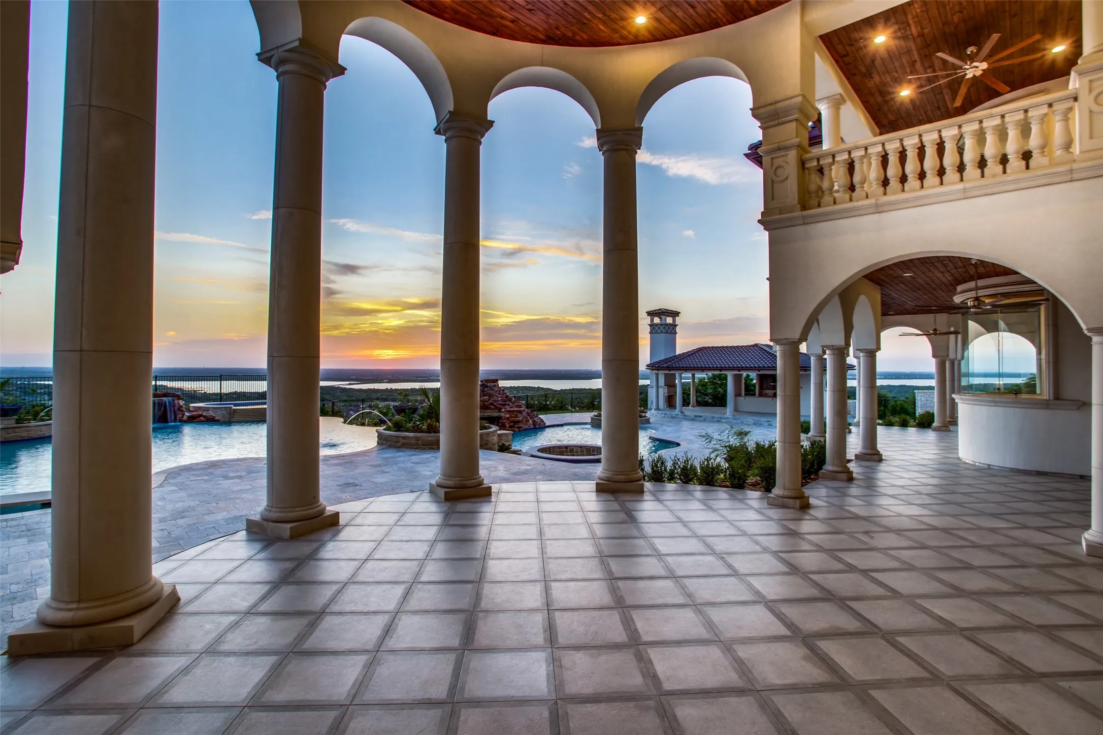The view from the primary suite retreat will never grow old, as you relax into the comfort of surveying your luxurious estate.