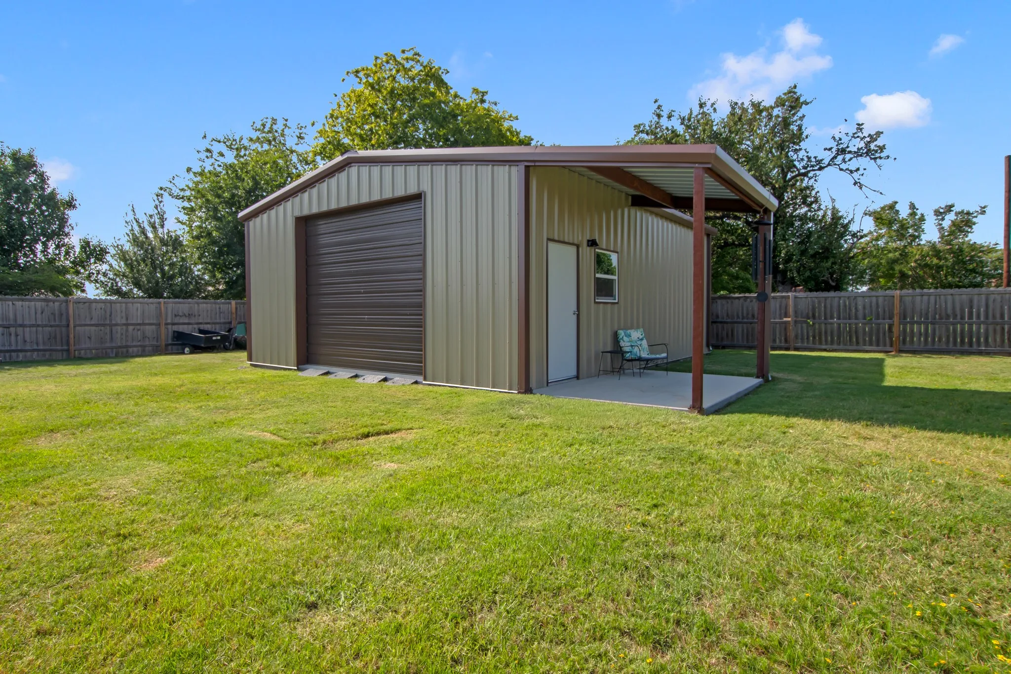 25x30 metal shop with roll-up door and 110/220 electrical service