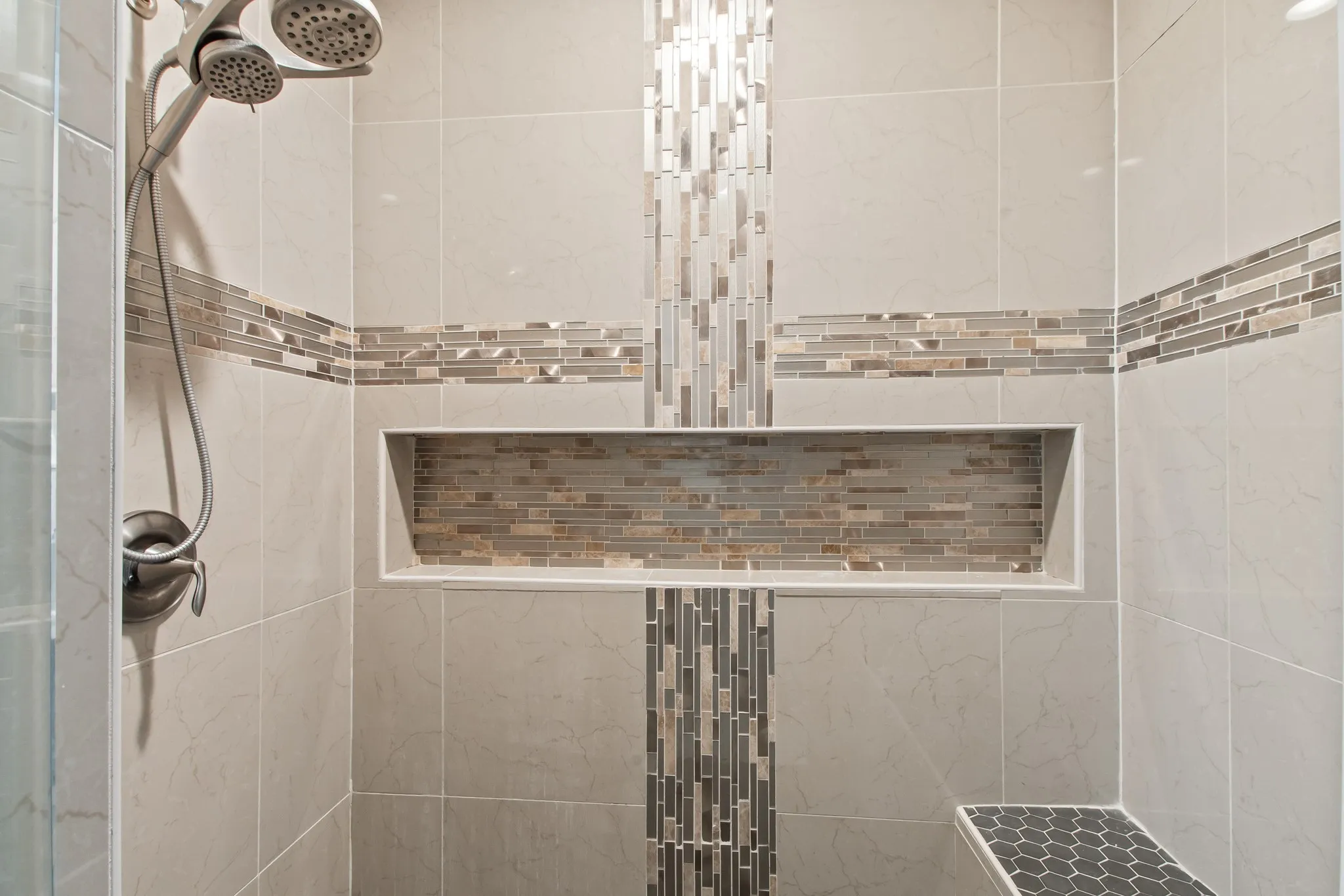 Primary walk-in tiled shower