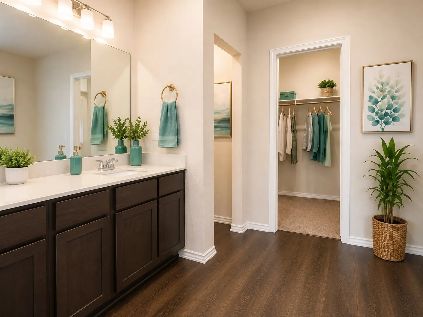 Bathroom vanity featuring a white countertop with an undermount sink and dark wood-finish cabinetry