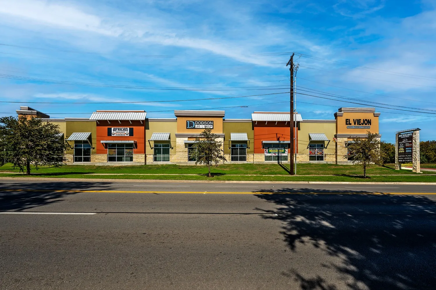 Directly across E McKinney St from the Denton Court Complex