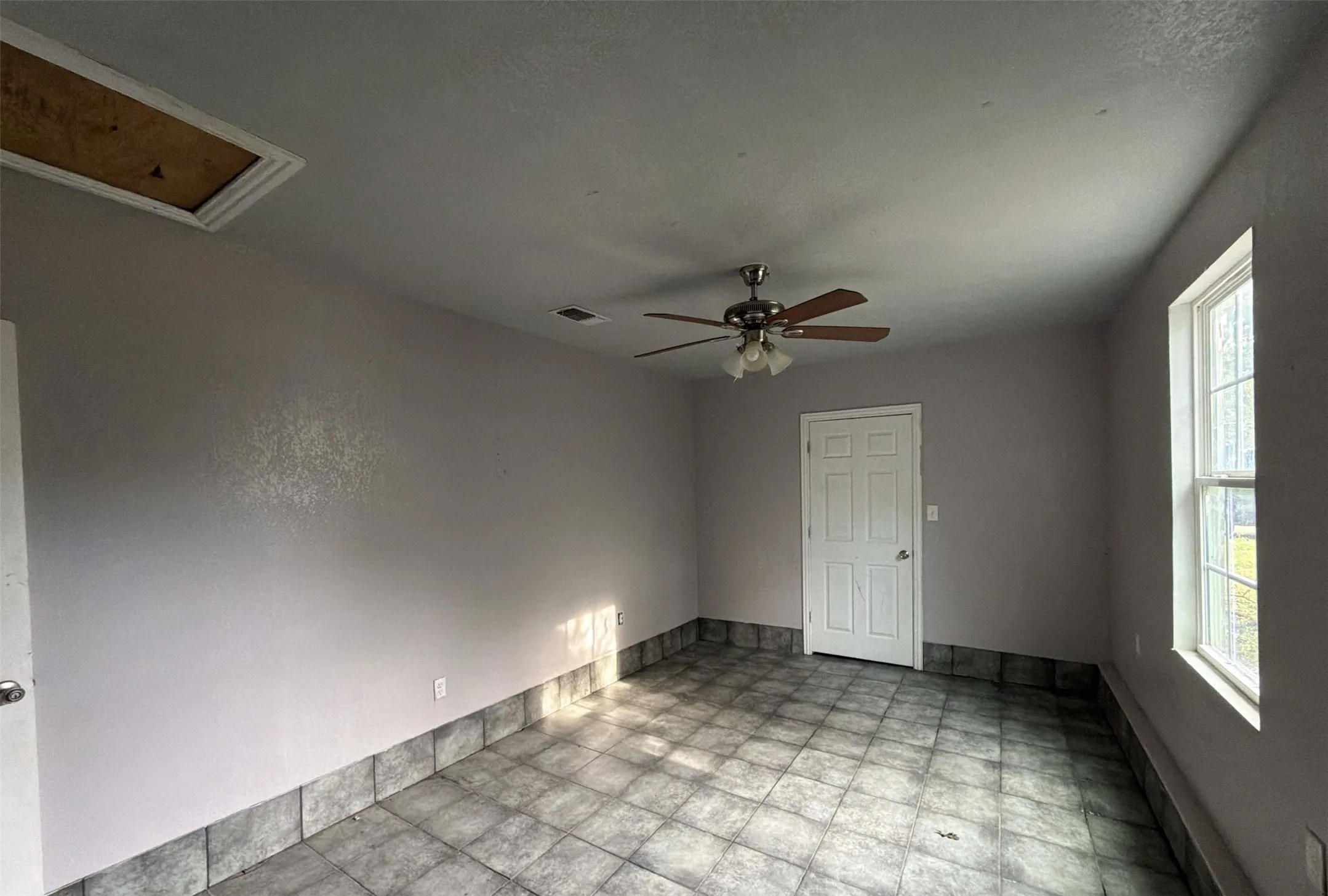 Additional living/flex room with outside entrance.