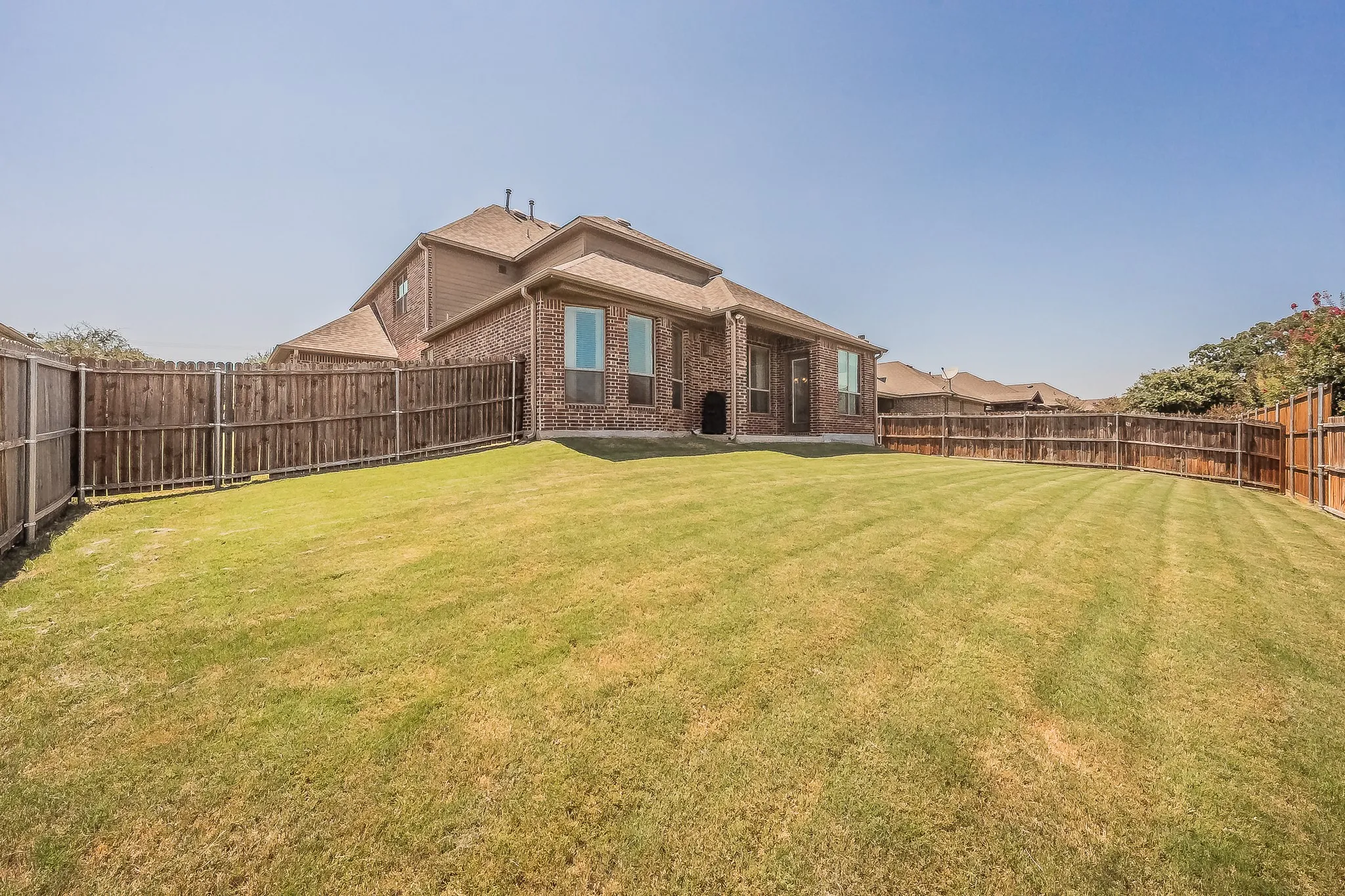 Backyard with privacy fence for outdoor fun
