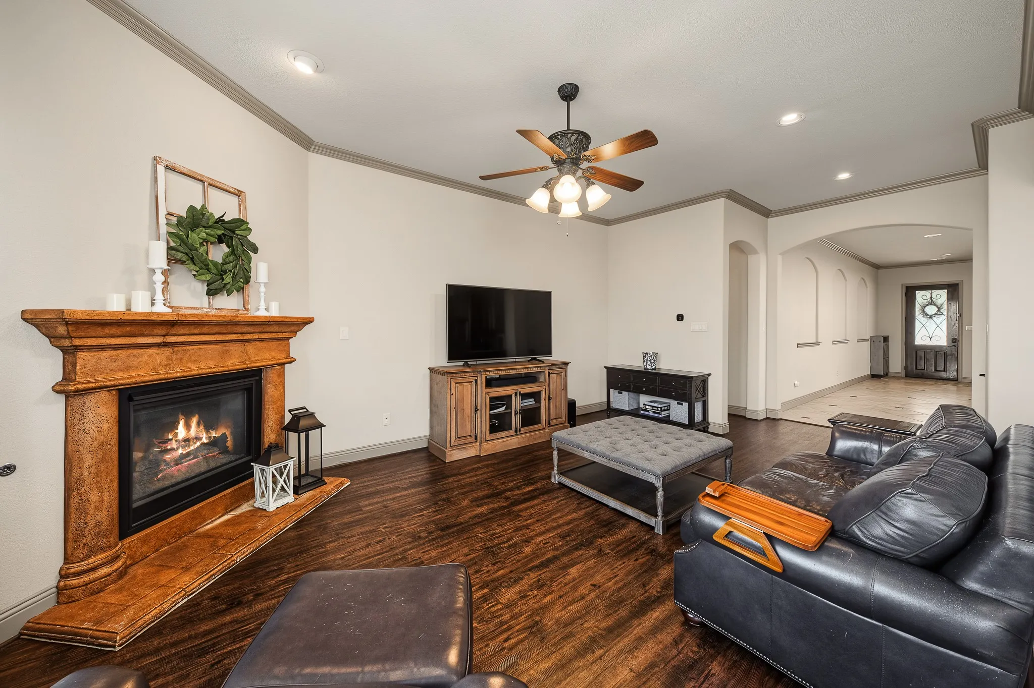Living room has fireplace with gas logs