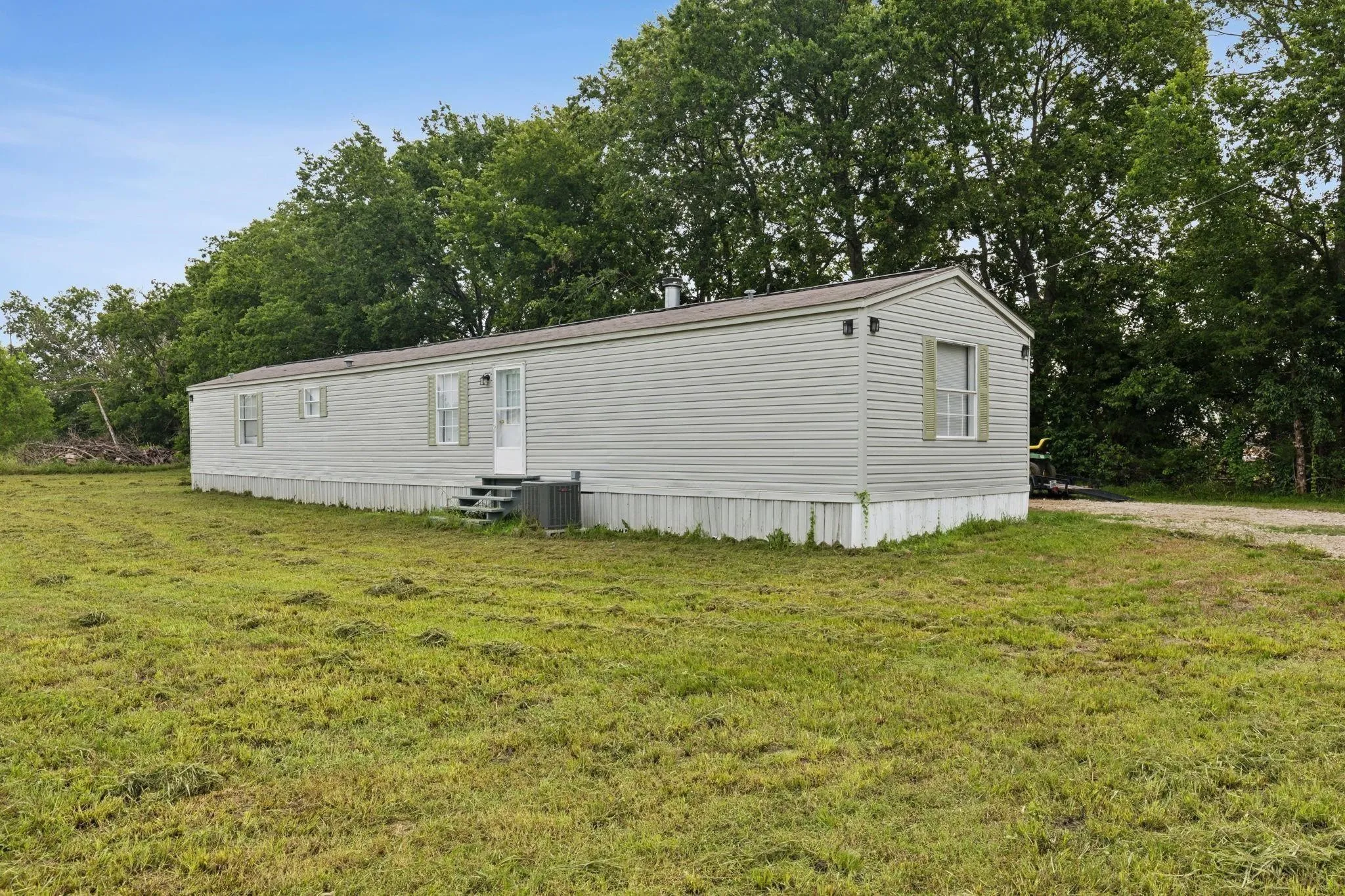 Mobile Home For Rent in Hunt County , 1946 County Road 2290, Quinlan, Texas 75474, 3 Bedroom, 2 Bathroom, Garage spaces, 1,216 Sqft, built in 2008, mls#21342847, Real Estate Agent in Quinlan, Homes For Rent in Hunt county, Homes For Rent in Quinlan, Realtor in Quinlan Texas, Real Estate Brokerage Independent Realty Texas, Luminita Cordes Realtor