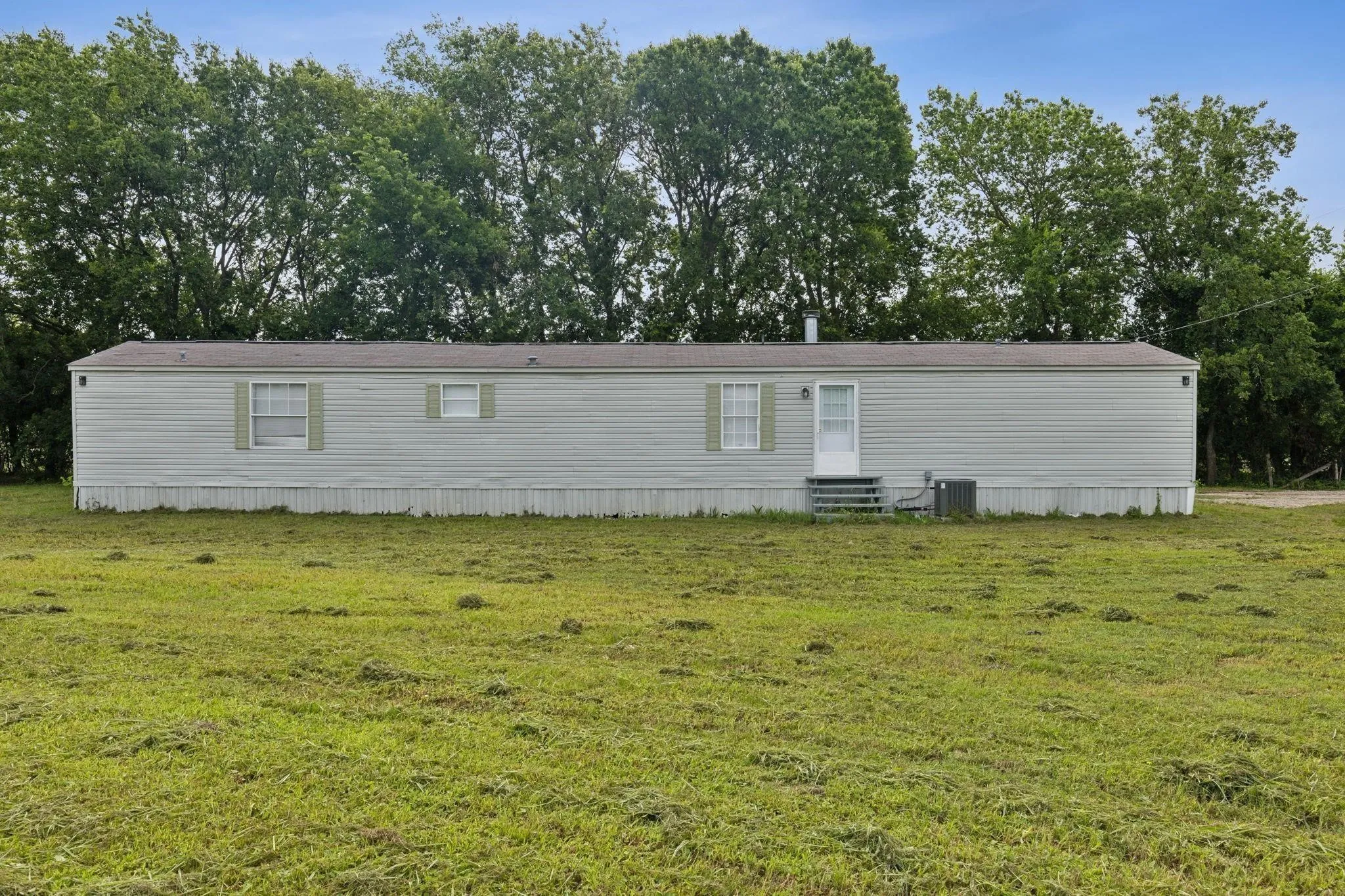Mobile Home For Rent in Hunt County , 1946 County Road 2290, Quinlan, Texas 75474, 3 Bedroom, 2 Bathroom, Garage spaces, 1,216 Sqft, built in 2008, mls#21342847, Real Estate Agent in Quinlan, Homes For Rent in Hunt county, Homes For Rent in Quinlan, Realtor in Quinlan Texas, Real Estate Brokerage Independent Realty Texas, Luminita Cordes Realtor