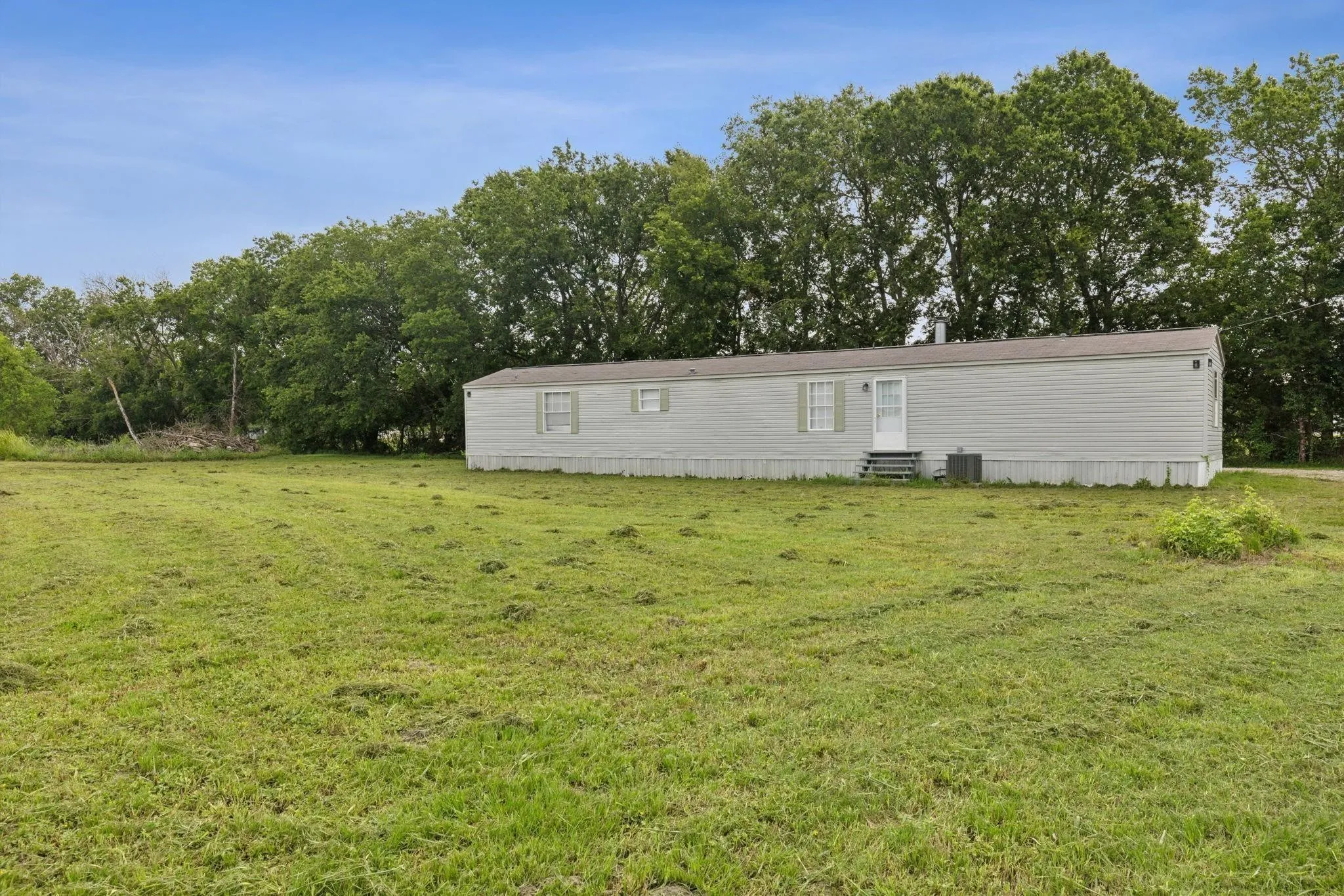 Mobile Home For Rent in Hunt County , 1946 County Road 2290, Quinlan, Texas 75474, 3 Bedroom, 2 Bathroom, Garage spaces, 1,216 Sqft, built in 2008, mls#21342847, Real Estate Agent in Quinlan, Homes For Rent in Hunt county, Homes For Rent in Quinlan, Realtor in Quinlan Texas, Real Estate Brokerage Independent Realty Texas, Luminita Cordes Realtor