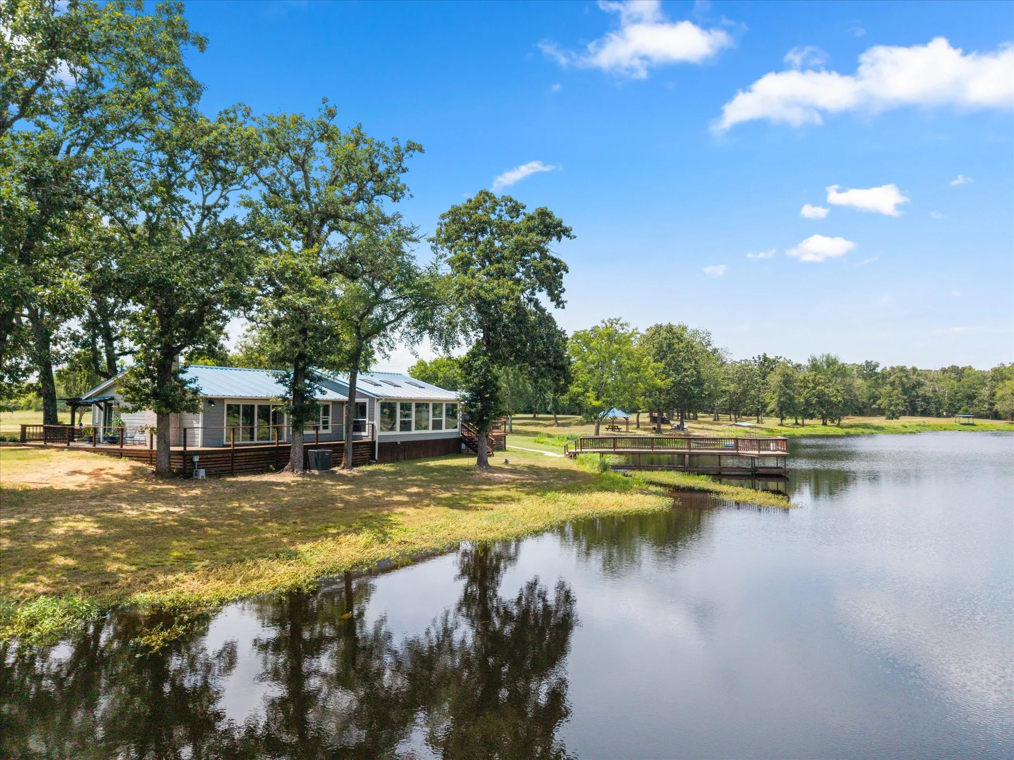 Single Family Residence For Sale in Rains County , 992 RS County Road 4325, Emory, Texas 75440, 3 Bedrooms, 3 Bathrooms, 6 Garage spaces, 2,312 Sqft, built in 1965, Price $1,900,000, mls#21342638, Real Estate Agent in Emory, Homes For Sale in Rains county, Homes For Sale in Emory, Realtor in Emory Texas, Real Estate Brokerage Independent Realty Texas, Luminita Cordes Realtor