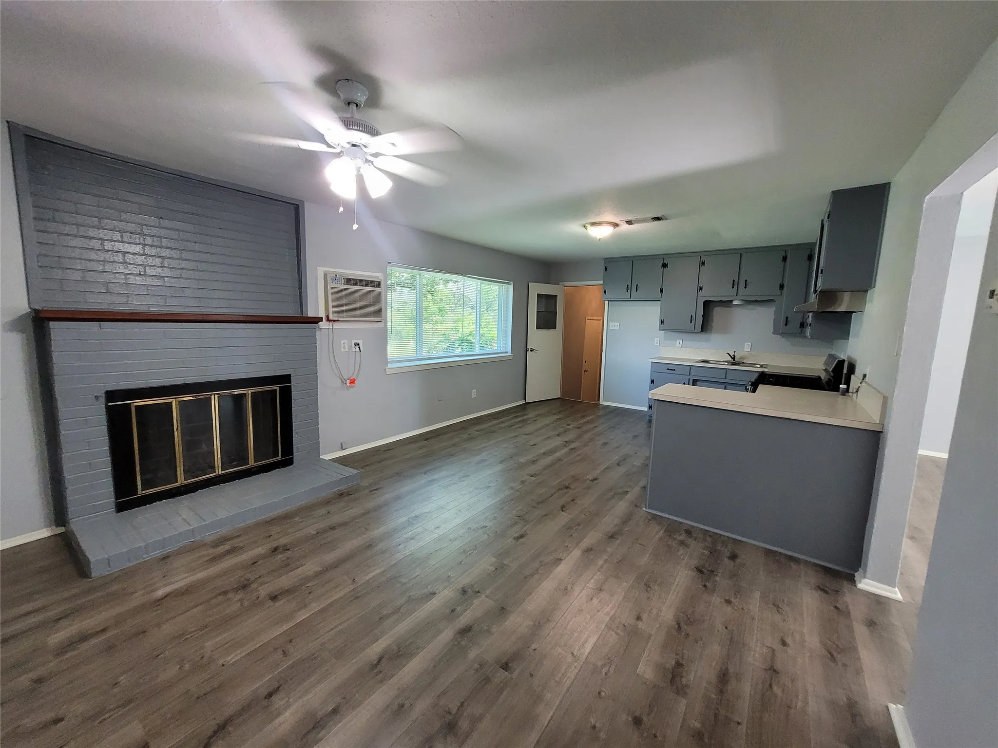 Family room is open to the breakfast area and kitchen.