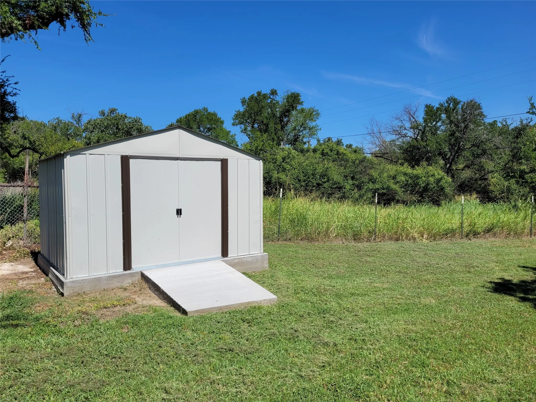 New storage building on a concrete slab.