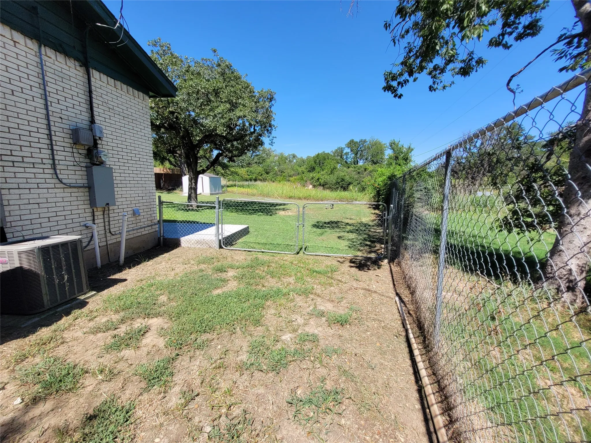 Double gate leads to backyard.
