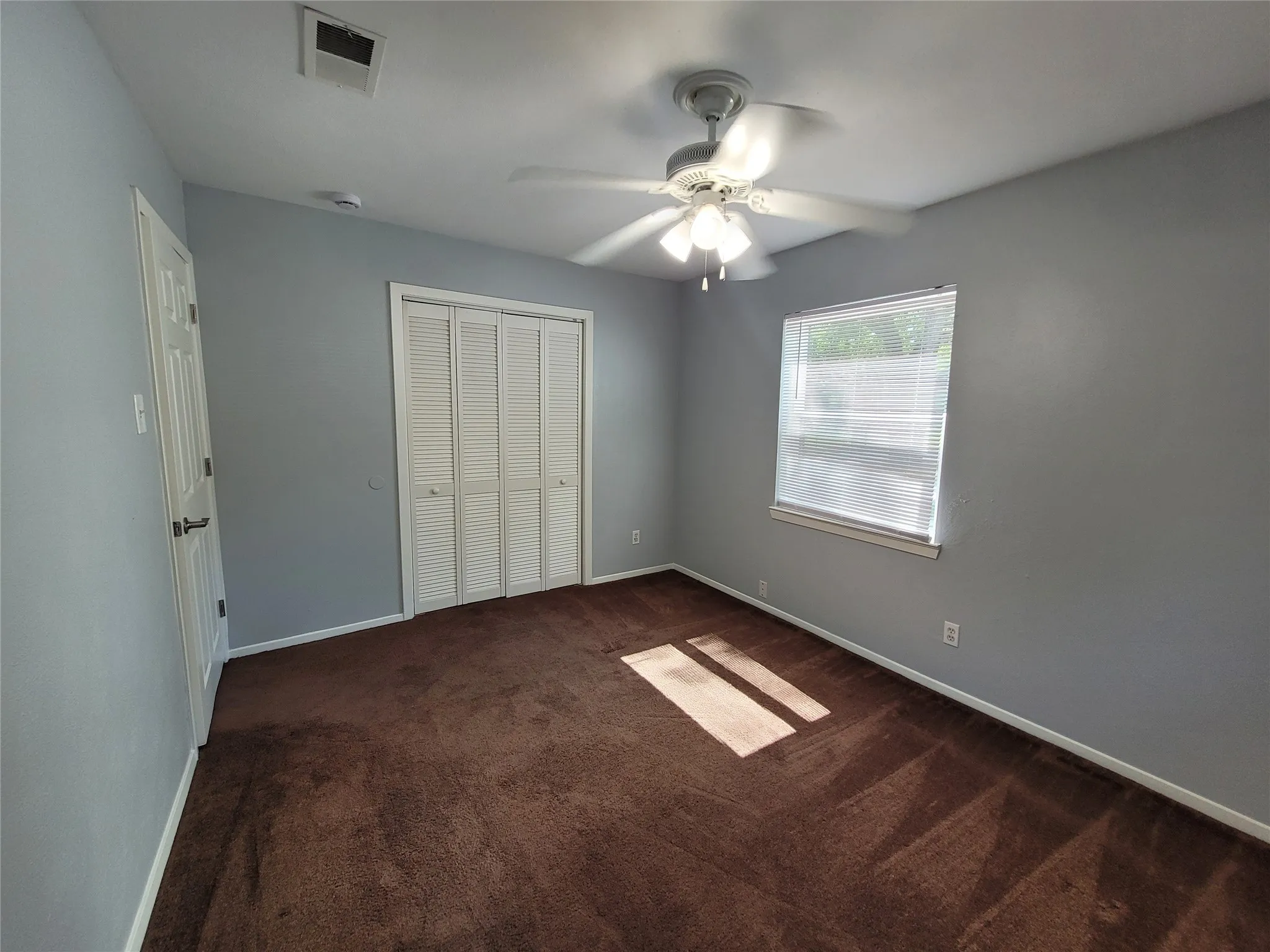 Front bedroom has wide closet space.