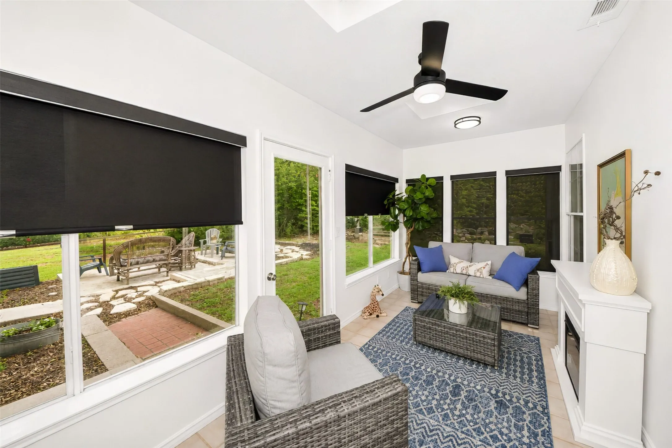Heat cooled sun room with entry to back yard