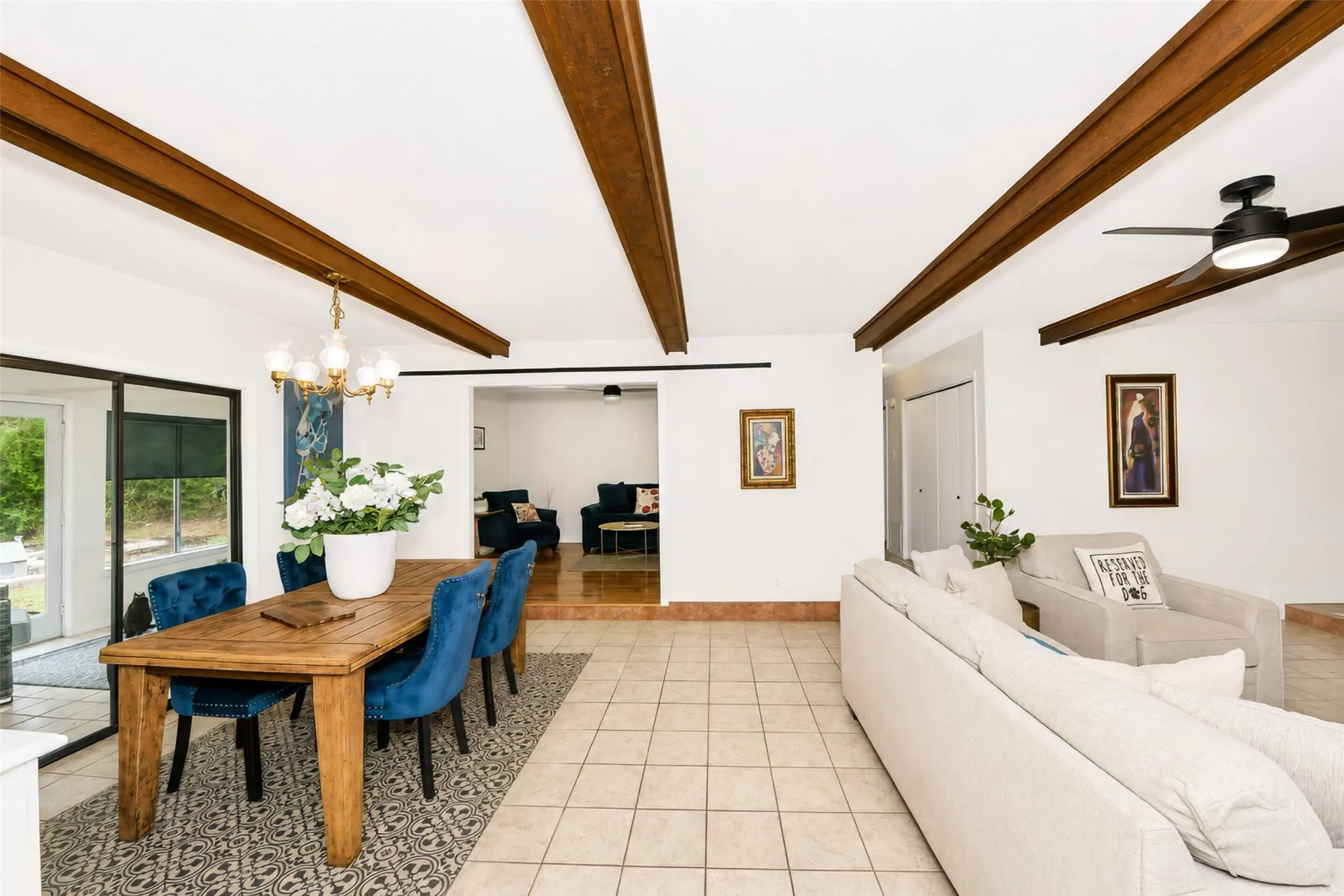 View from kitchen of large living room and secondary LR