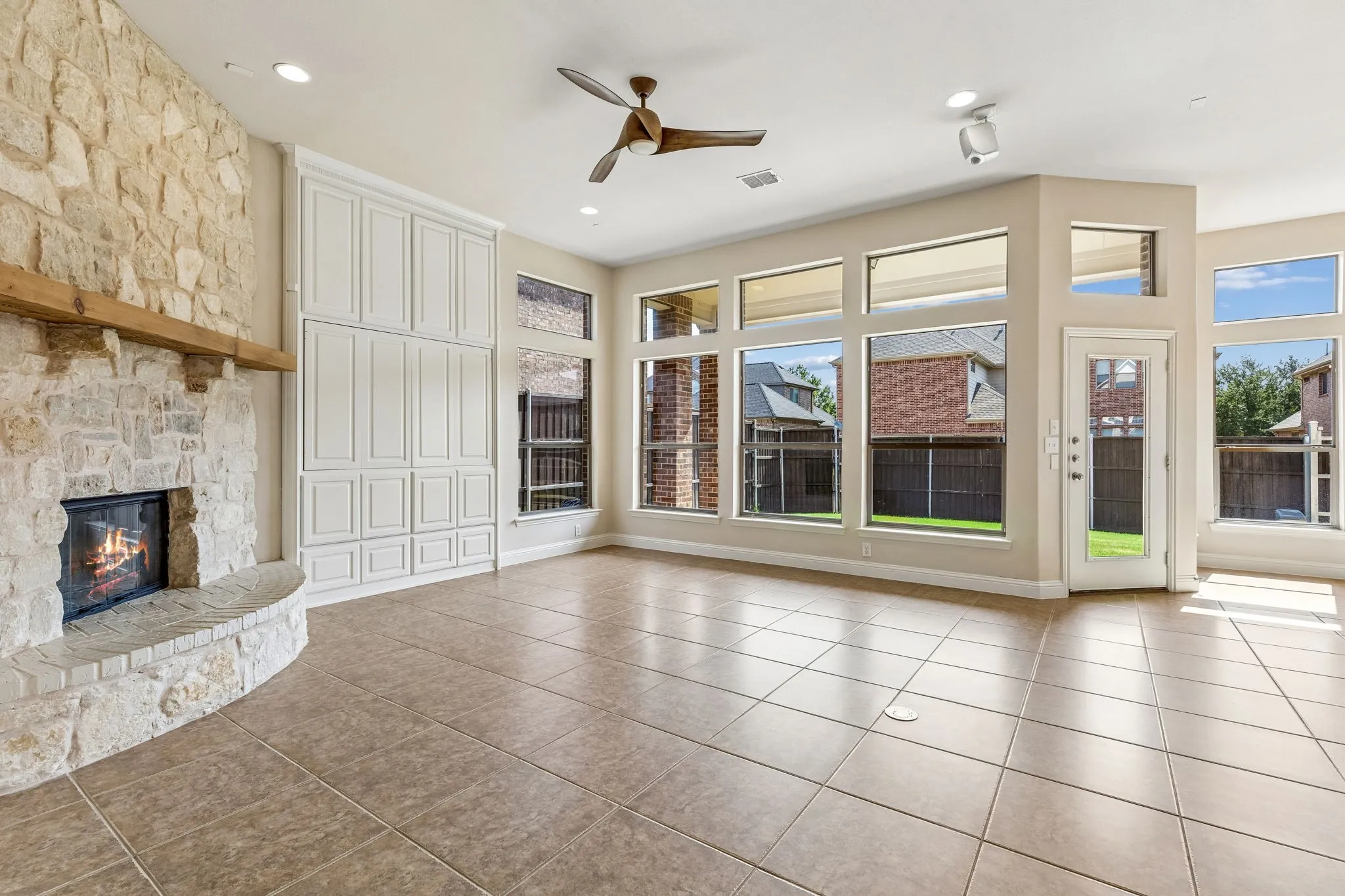 Living room with fireplace and surround sound wiring