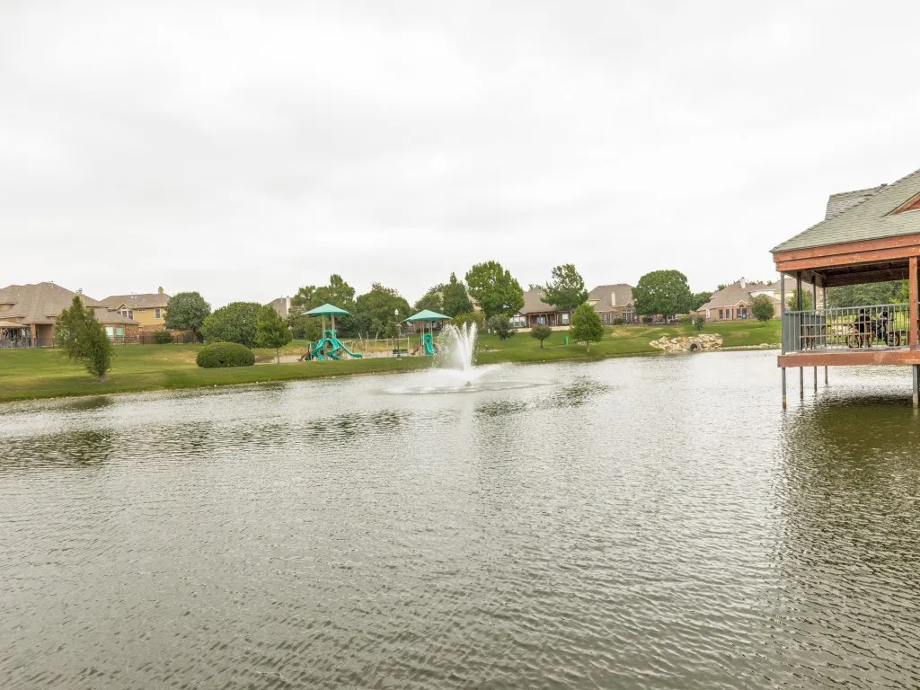Expansive body of water with a central fountain feature