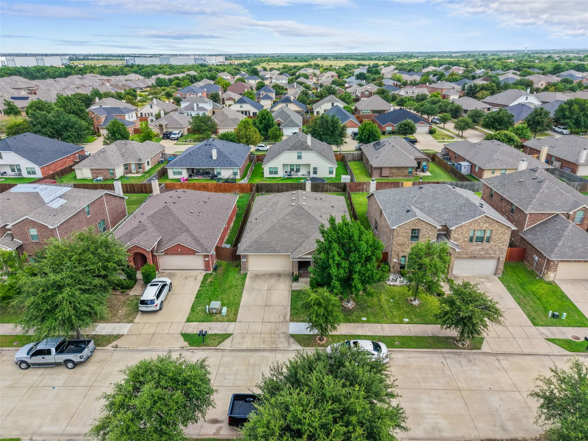 Aerial perspective showcasing a residential neighborhood with varied architectural styles