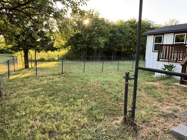 Large backyard is ideal for a garden or entertaining