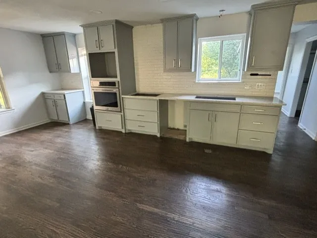 Your open kitchen offers plenty of space to add an island too!