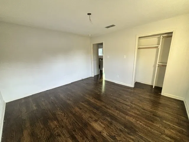 Secondary bedrooms with sleek hardwoods, great closet space and room for everyone to have their own privacy