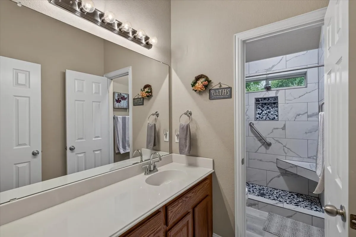 Hall bathroom with an updated shower