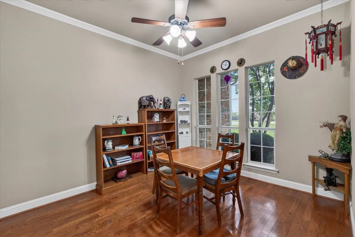 Formal dining room across from the home office as you enter the home.