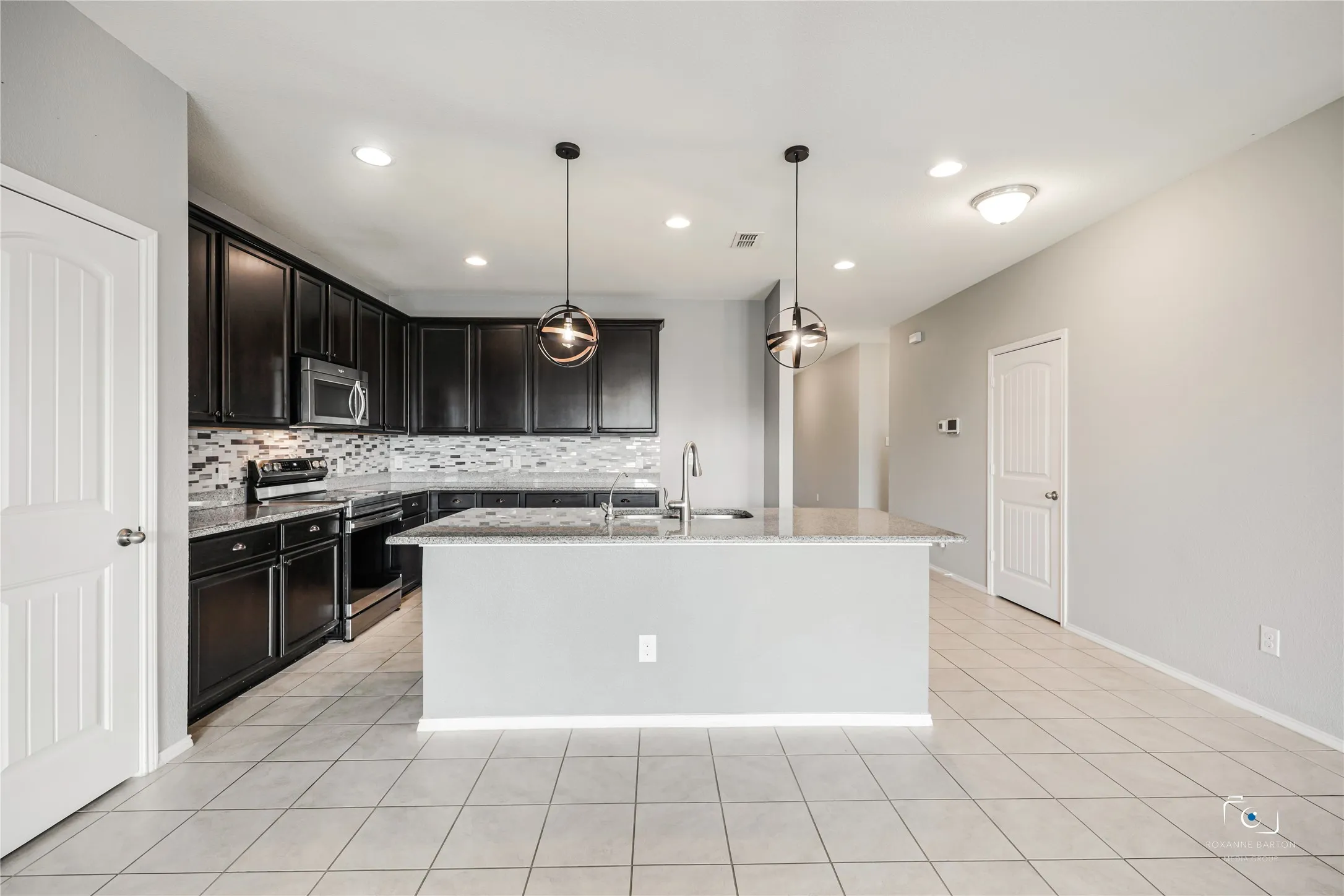 Another view of the beautifully appointed Kitchen in this spacious open floorplan