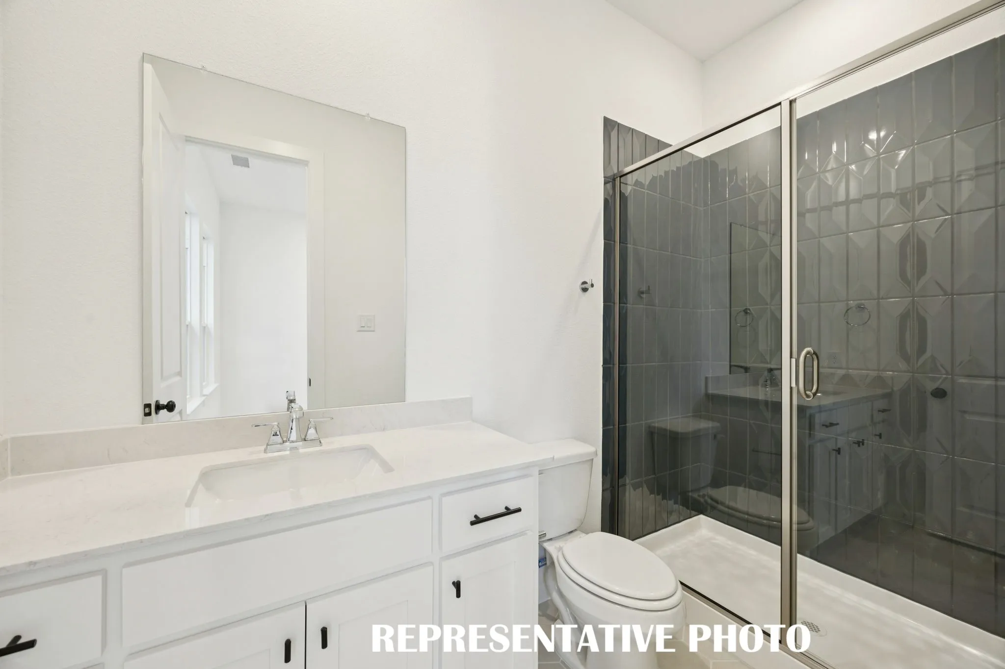 Friends and family will feel right at home in either of the beautifully finished guest baths our Elise plan offers.  REPRESENTATIVE PHOTO