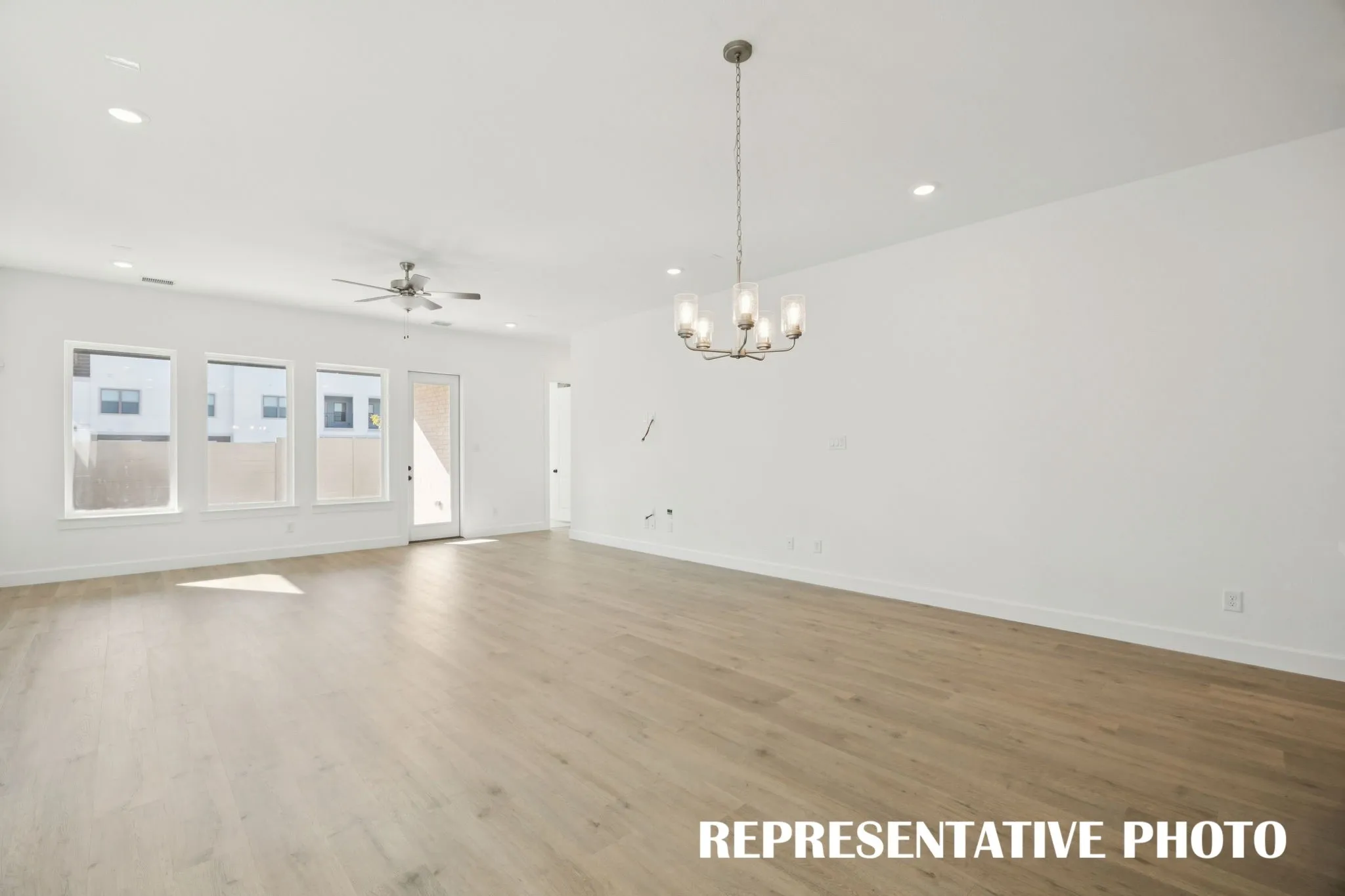 Whether it's lively parties or cozy family gatherings, this open concept dining-living space fits all occasions!
