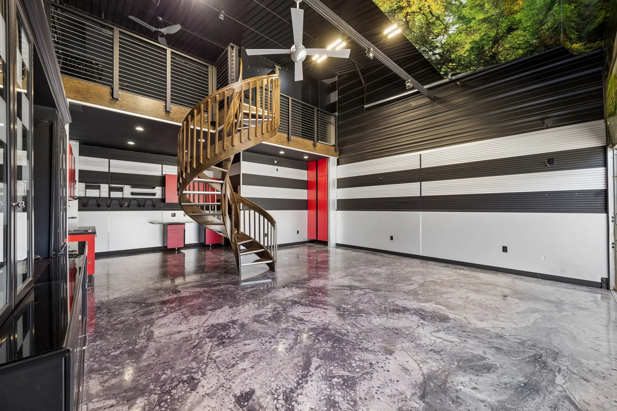 View of garage and mezzanine