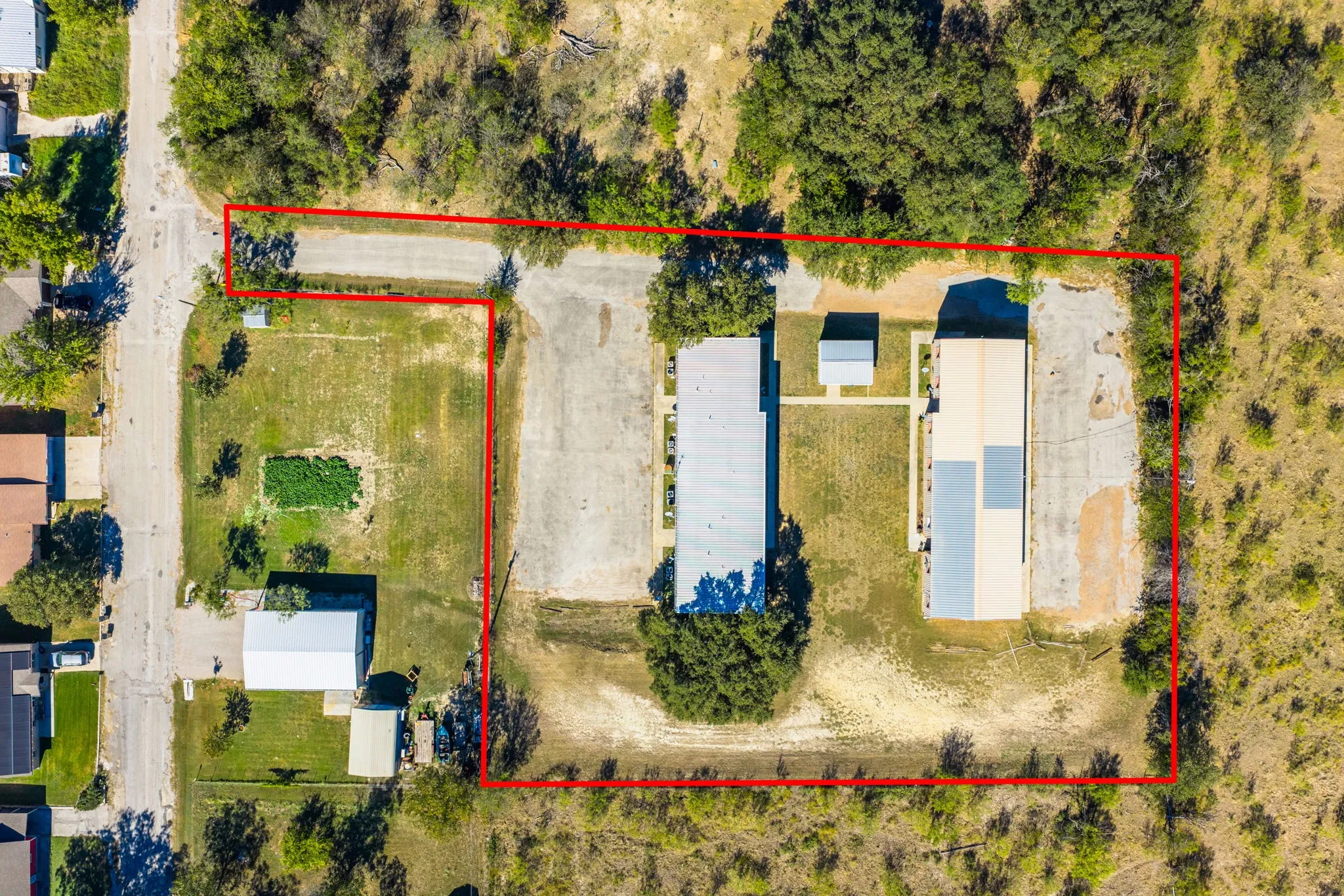 Aerial overview of property's location featuring property parcel outlined