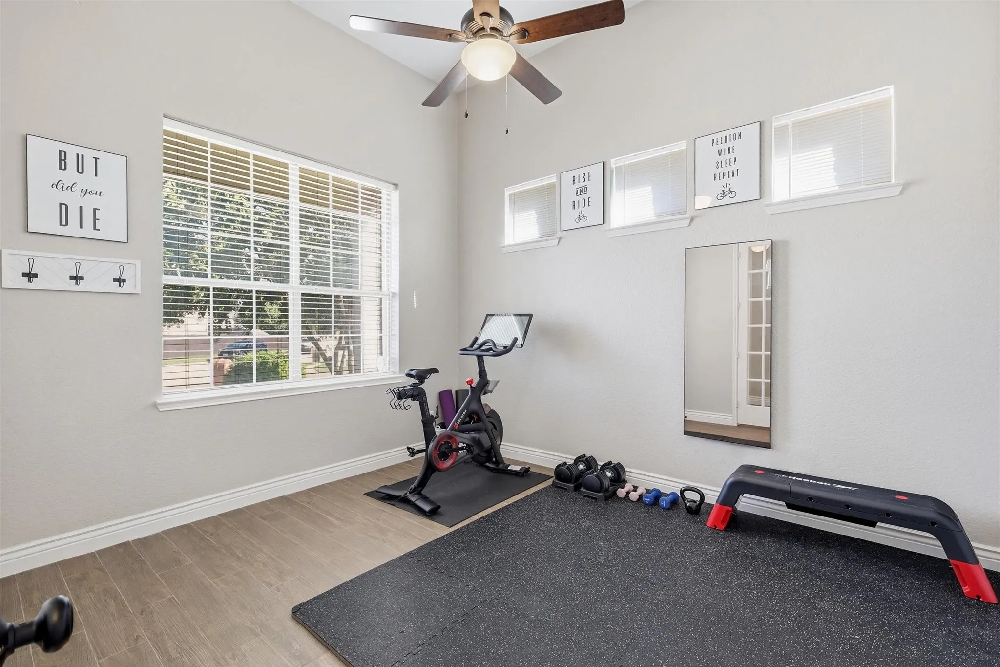  Could be an office! Room featuring vaulted ceilings and wood-finish flooring