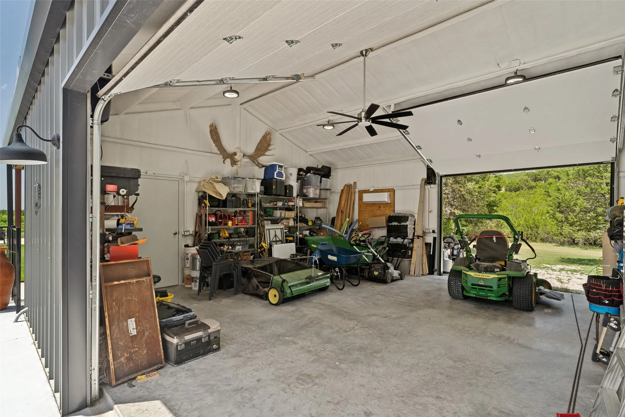 Drive-through insulated shop with mini-split wall unit, ceiling fan & 220
