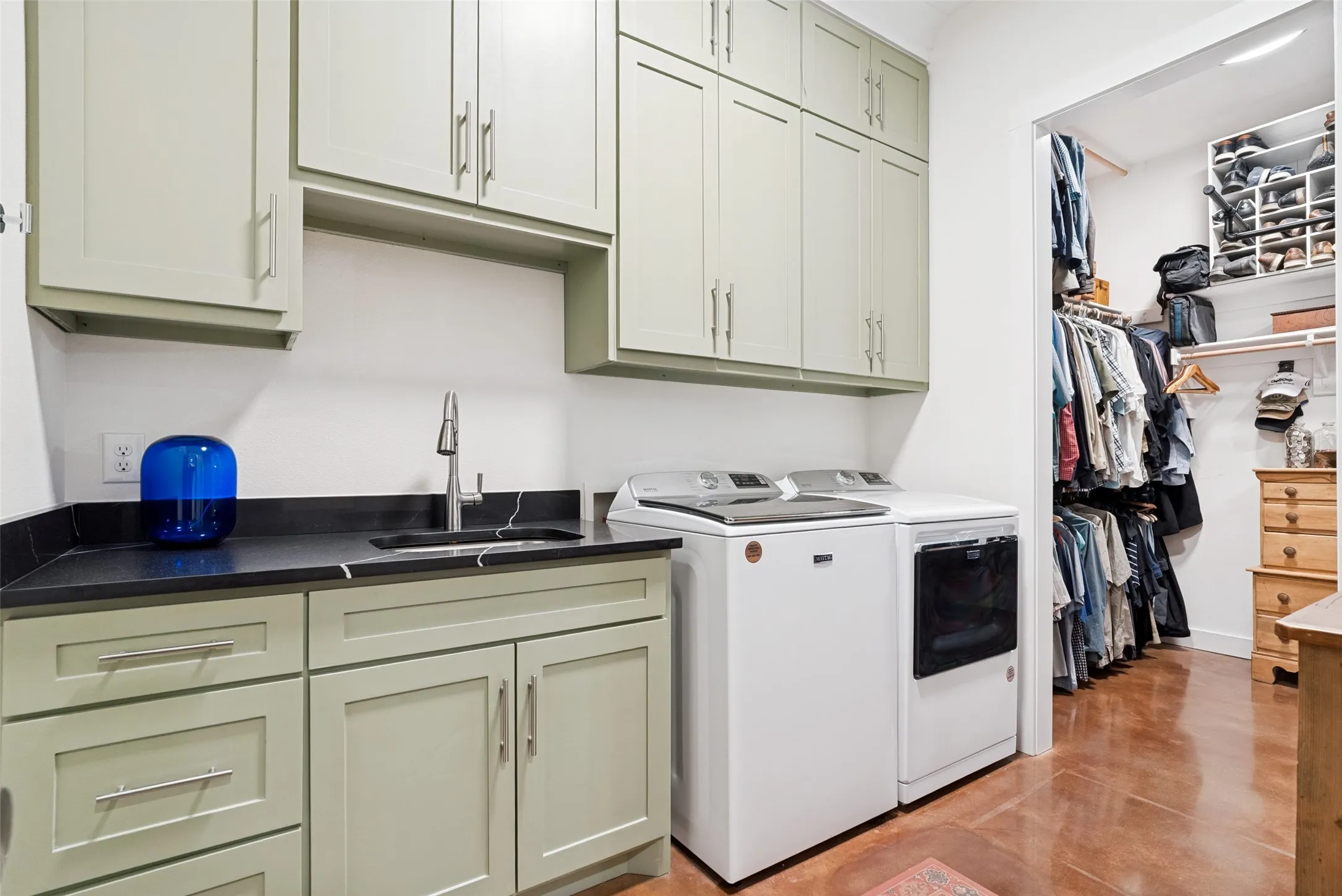 Ample storage and laundry sink
