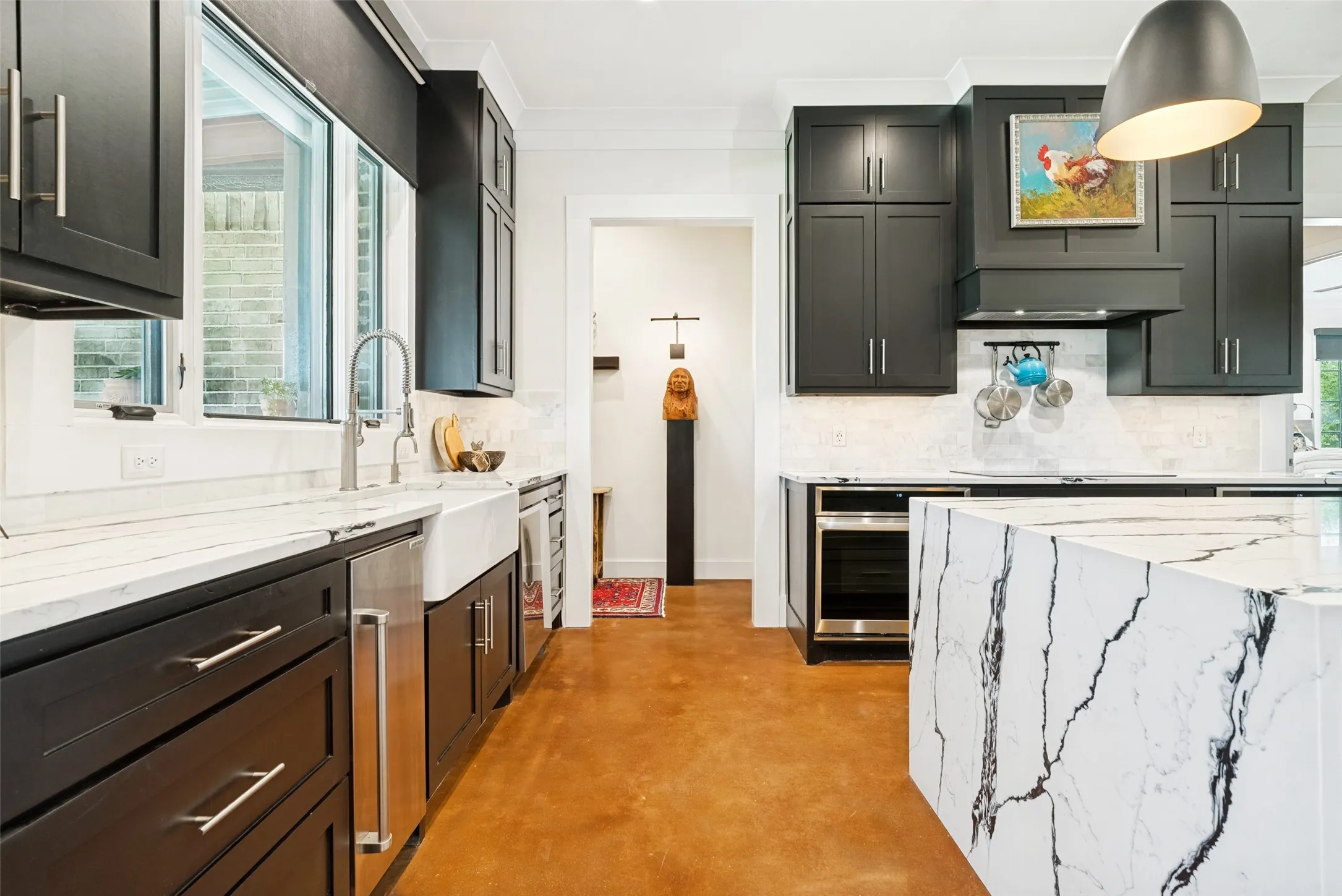 Deep drawers, built-in Sub-Zero ice maker, dishwasher, left oven