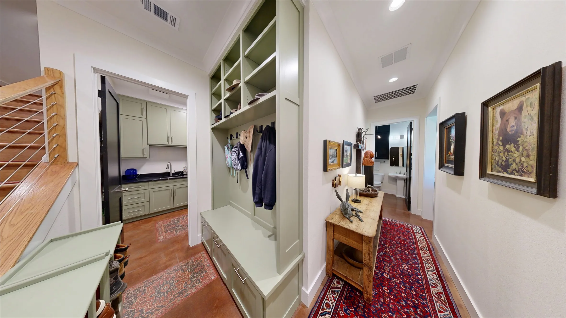 Drop zone, wooden stairway, ½ bath