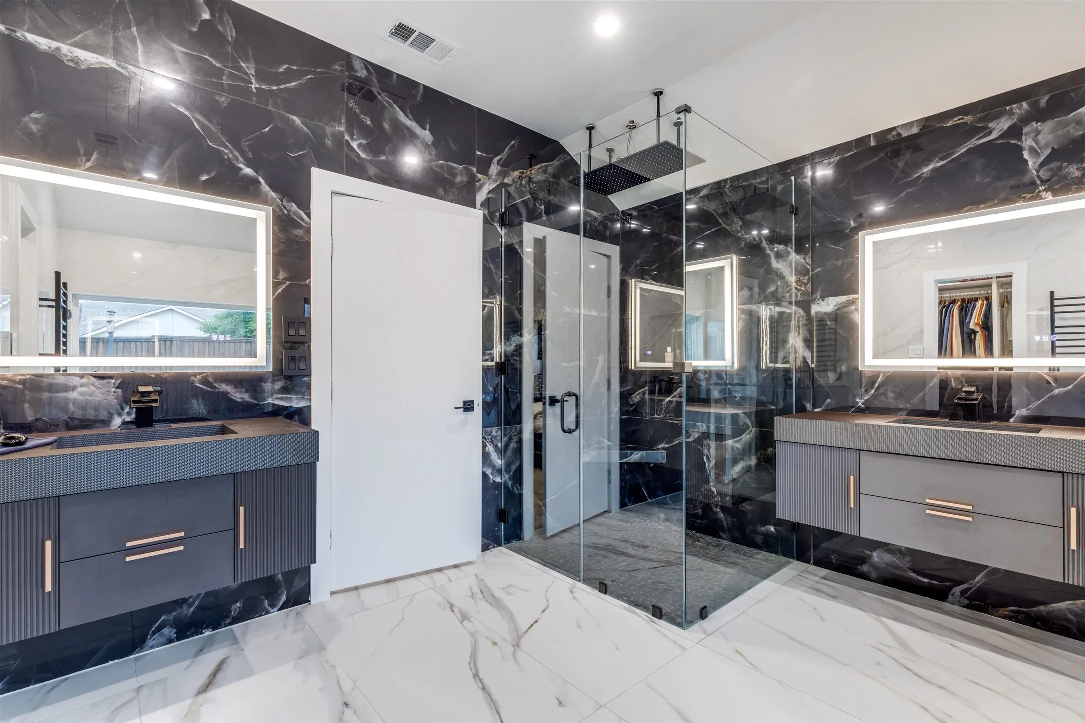 No detail went unnoticed in this gorgeous primary bath!