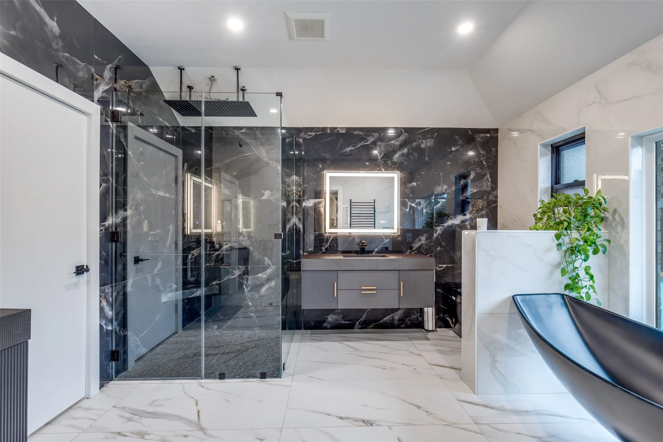 Separate shower and floating tub. Dual vanities. What else do you need?