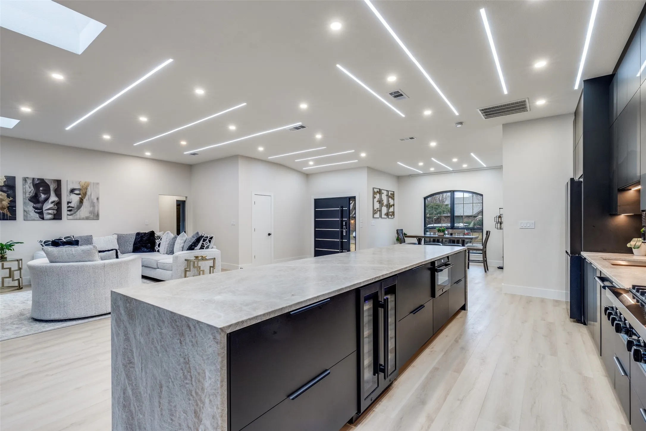 A view from the back of the kitchen, looking towards the front door.