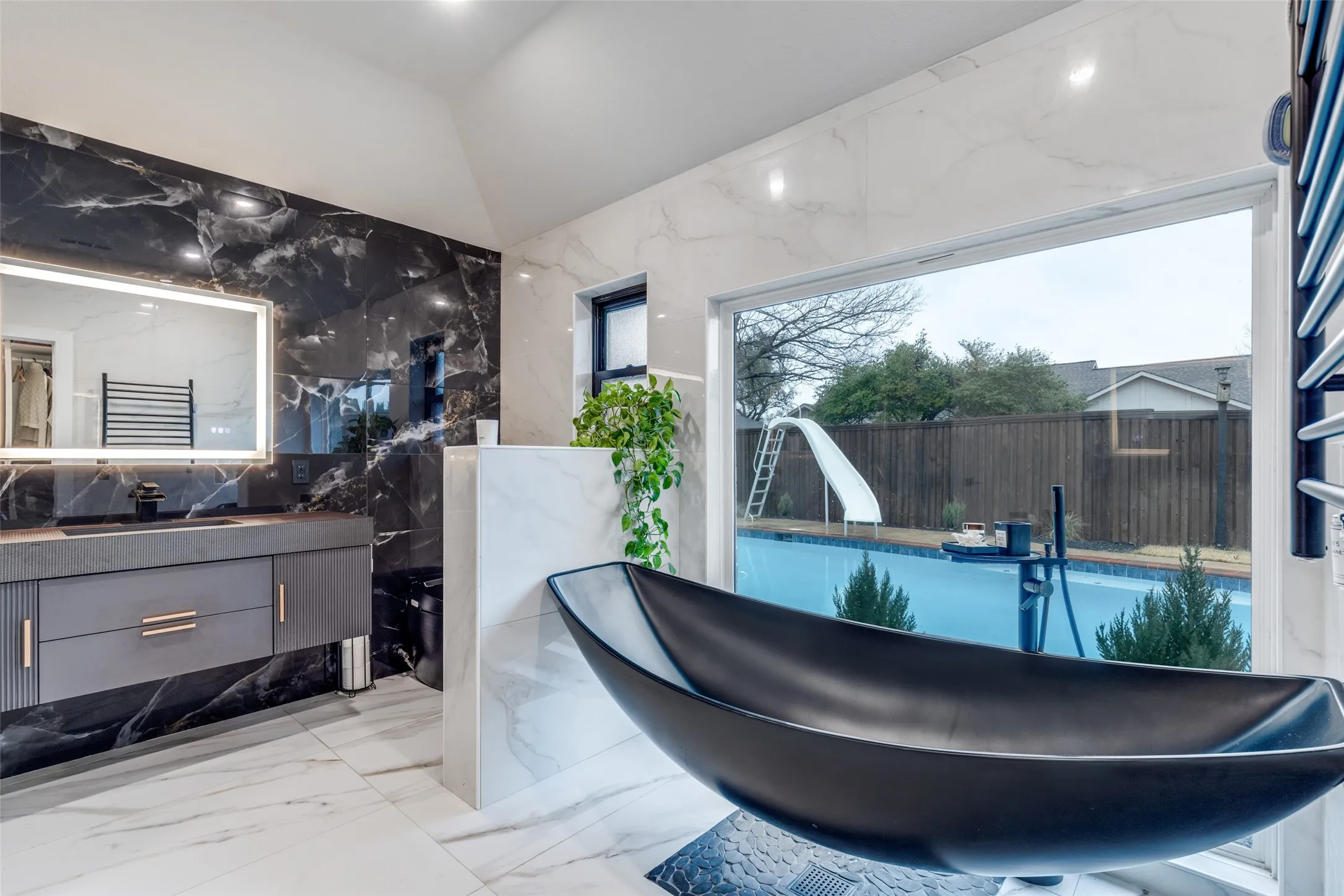 Imagine relaxing in this floating tub, overlooking your backyard oasis!