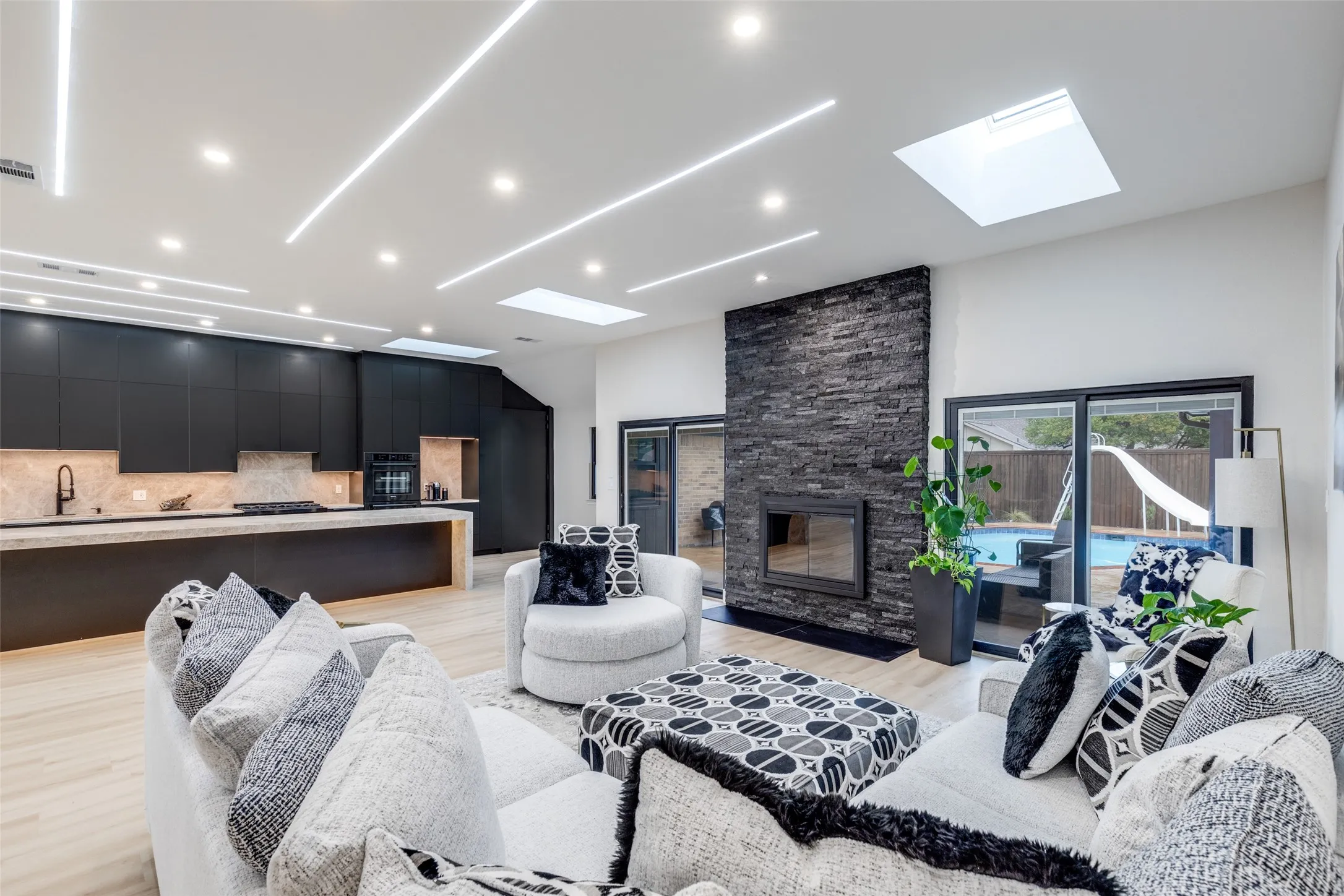 The living area opens up to the expansive kitchen space, perfect for entertaining!