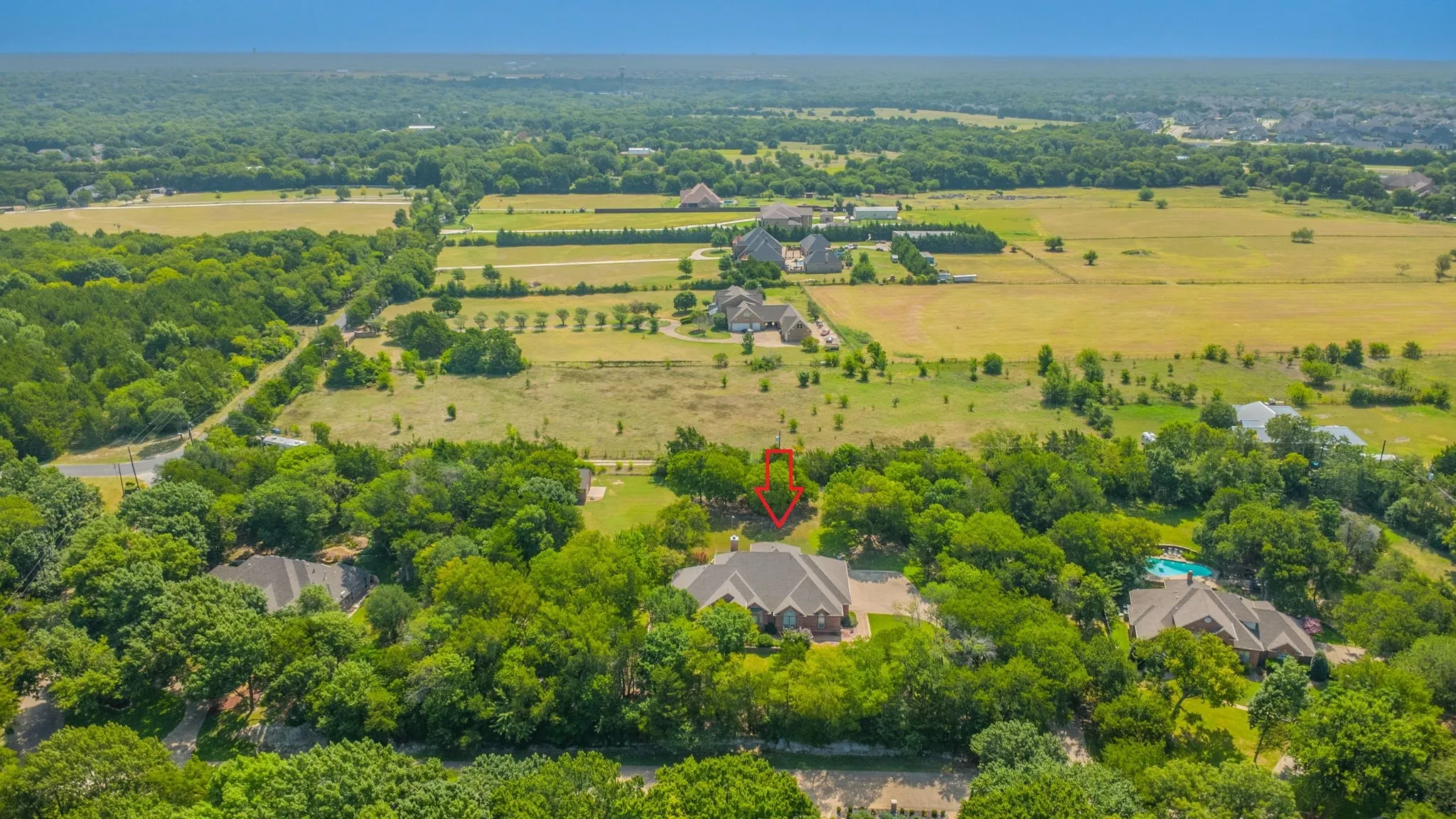 This gorgeous 1.78 acres is surrounded by trees and peaceful settings but so close to everything you need!