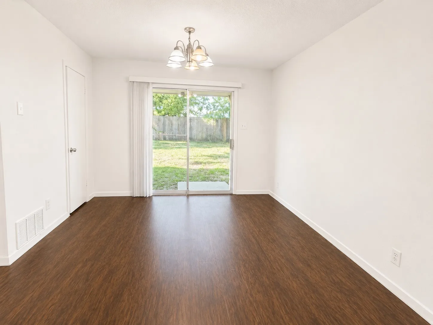Beautiful Dining Area with extra storage and view to the large backyard.