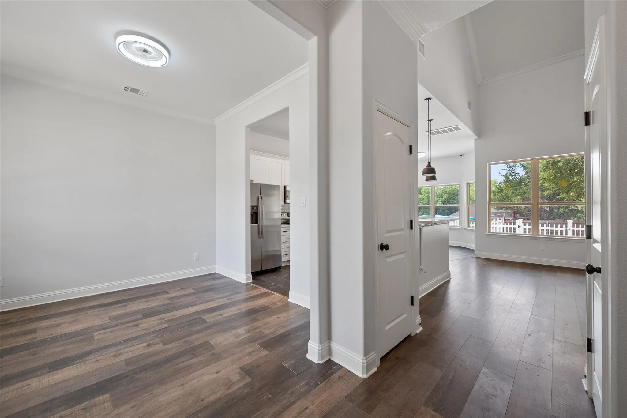 Open floor plan concept with views of the backyard as you enter the home!