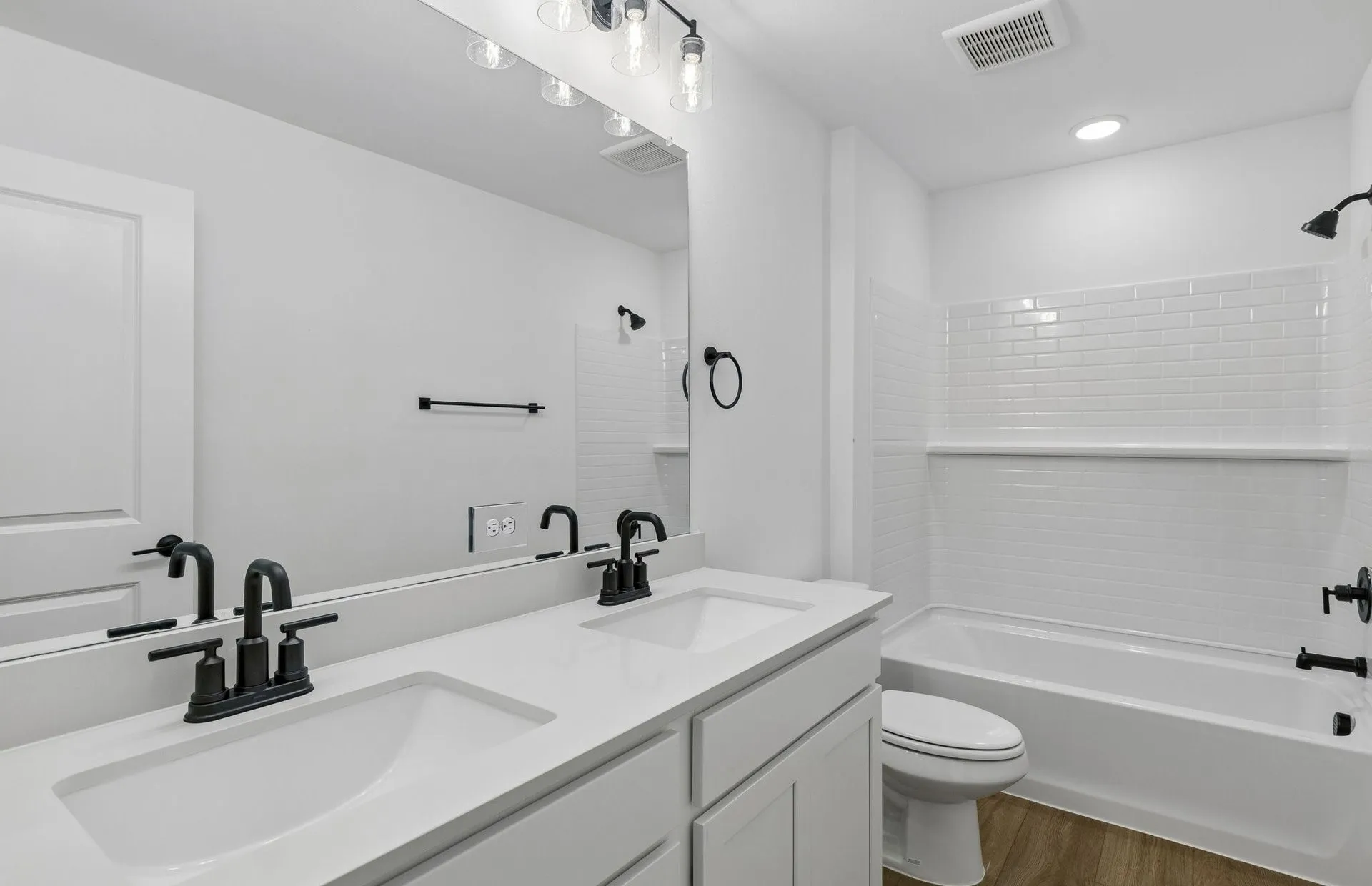 Secondary bath with tile surrounded shower