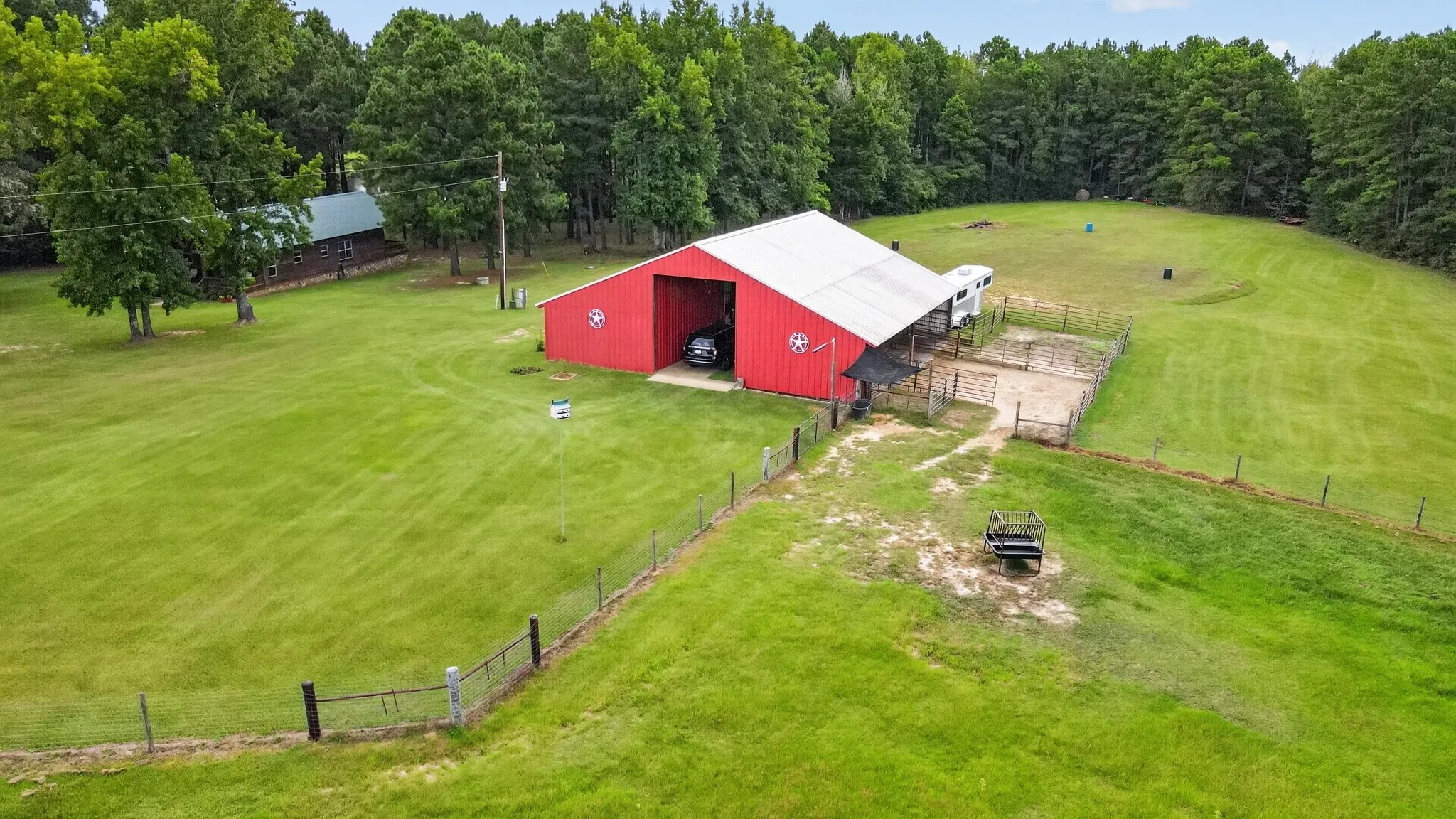 Aerial view showcasing the horse barn.