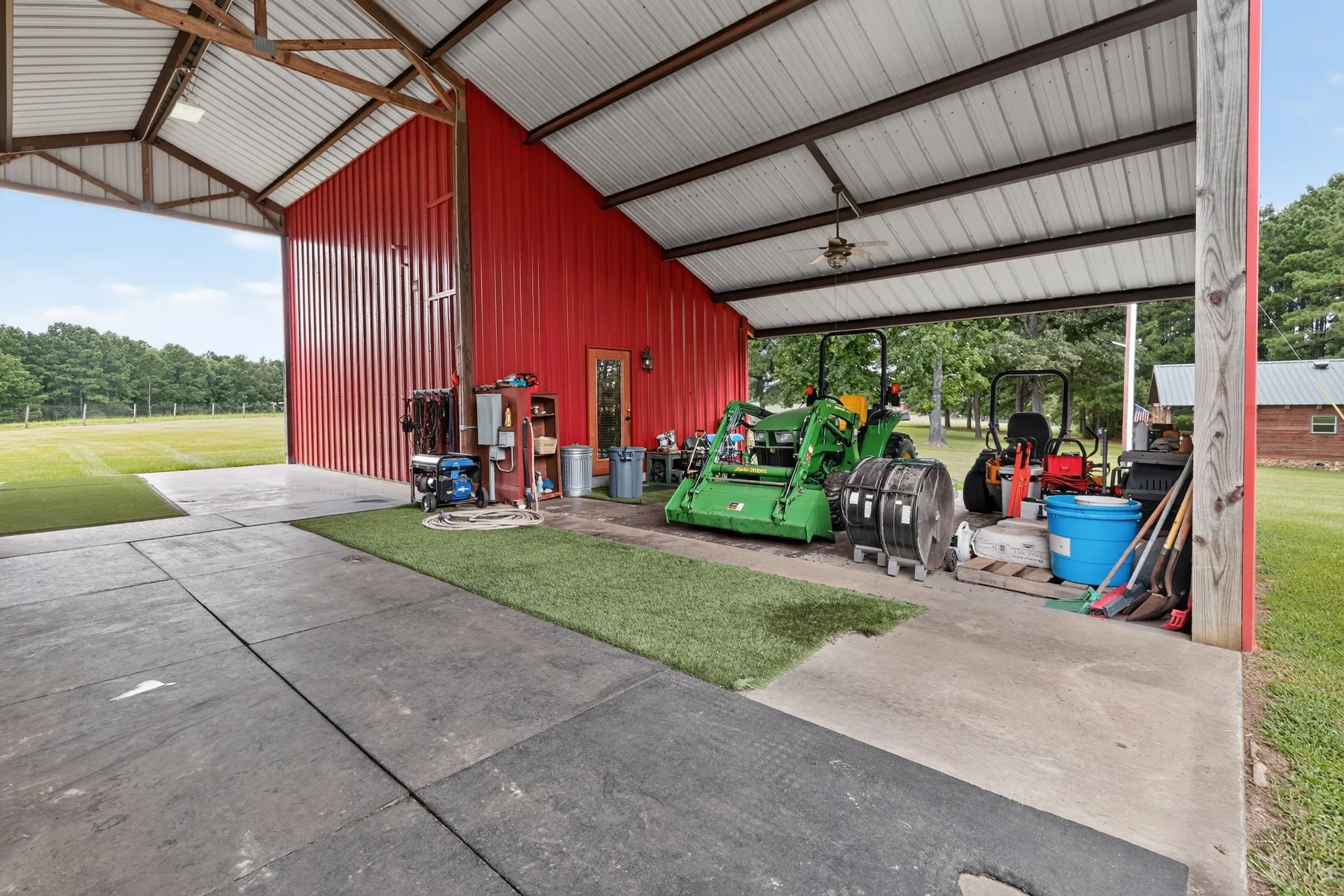Interior of the horse barn featuring a private guest suite with a full bath.